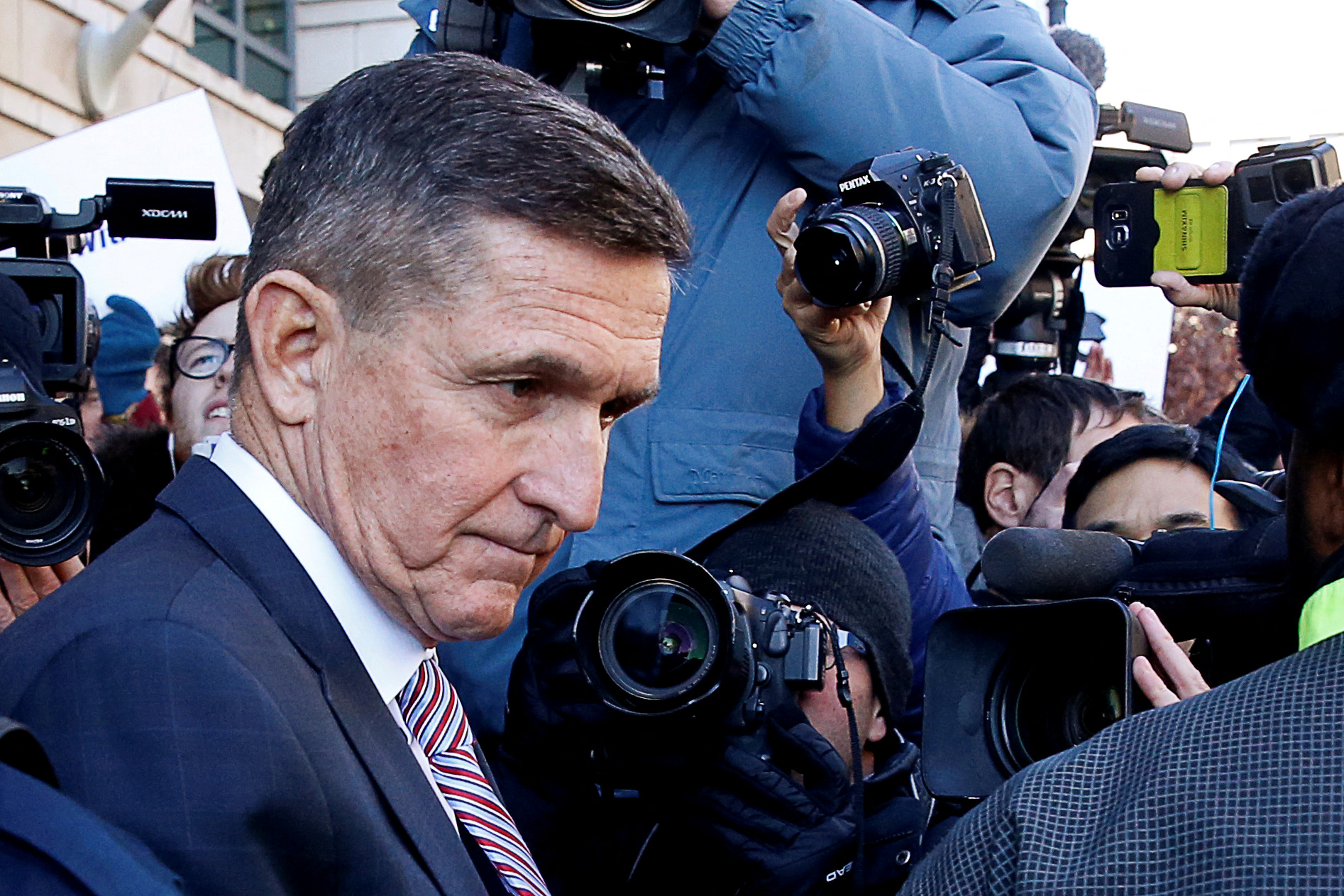Former U.S. national security adviser Flynn departs after sentencing hearing at U.S. District Court in Washington