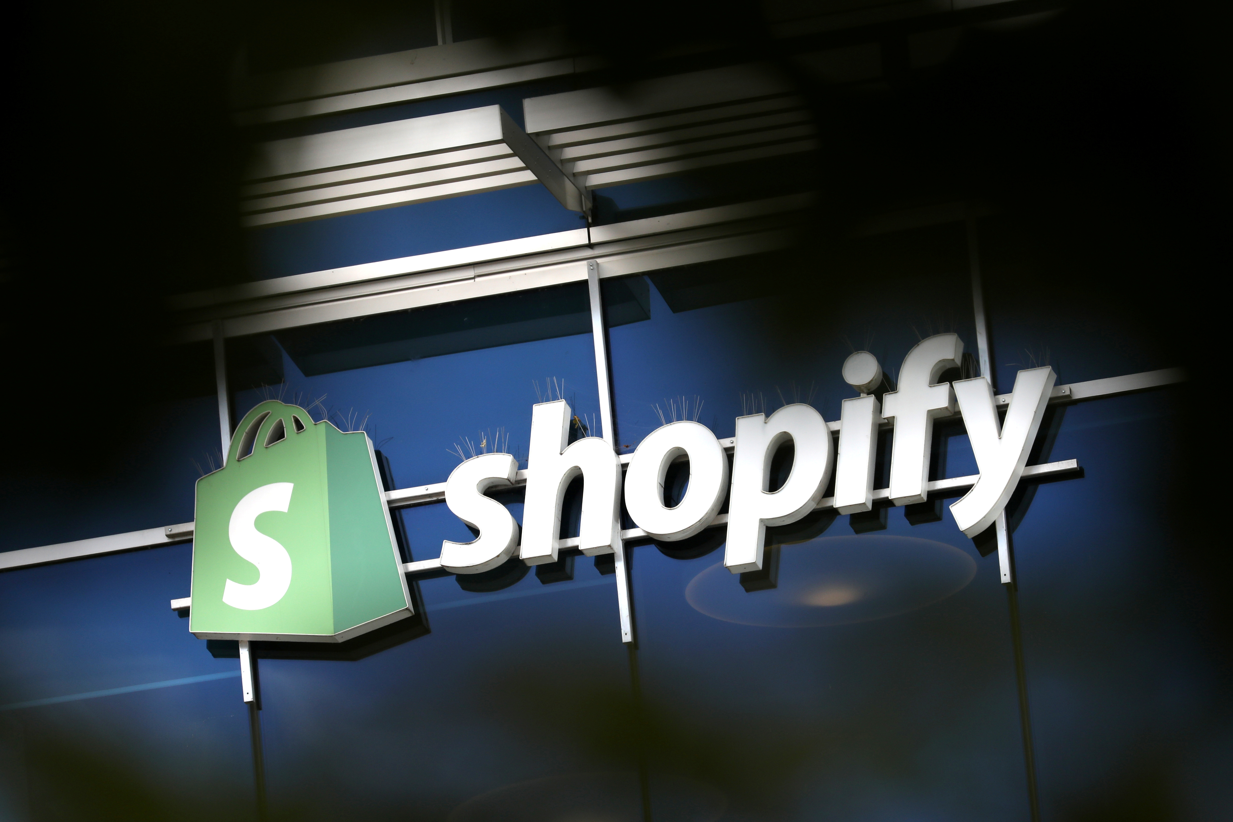 The logo of Shopify is seen outside its headquarters in Ottawa