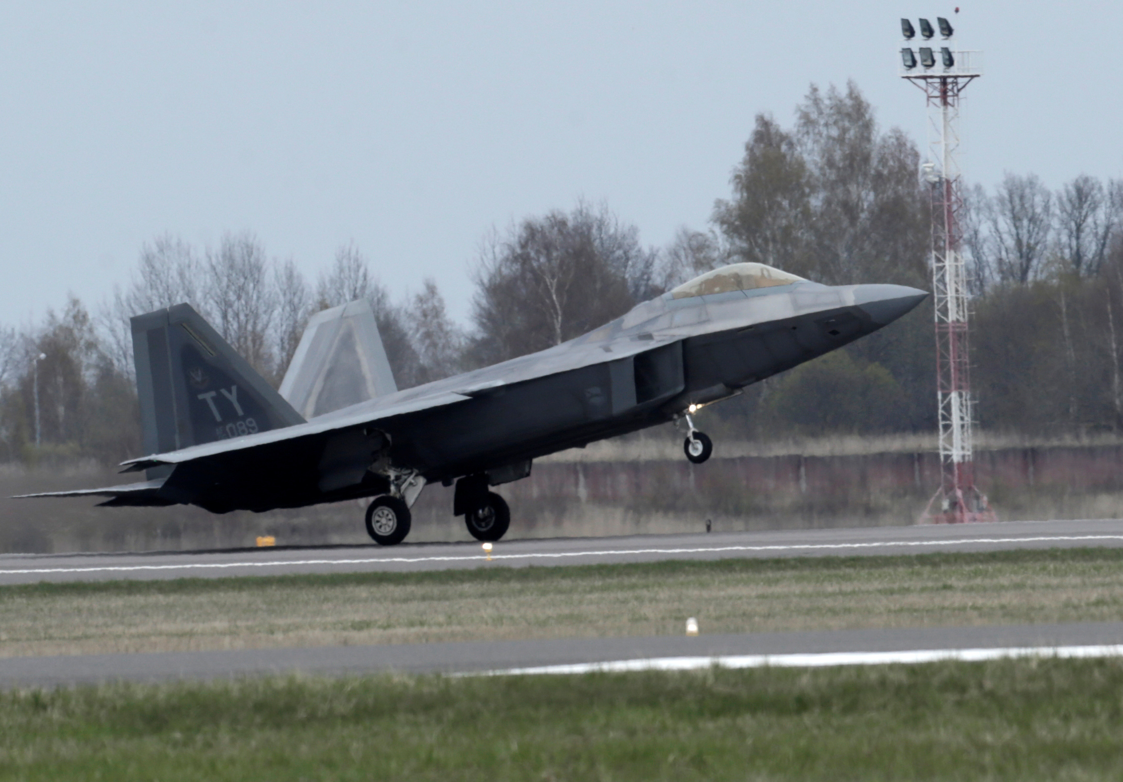 U.S. Air Force F-22 Raptor fighter lands in the military air base in Siauliai, Lithuania, April 27, 2016. REUTERS/Ints Kalnins/File Photo