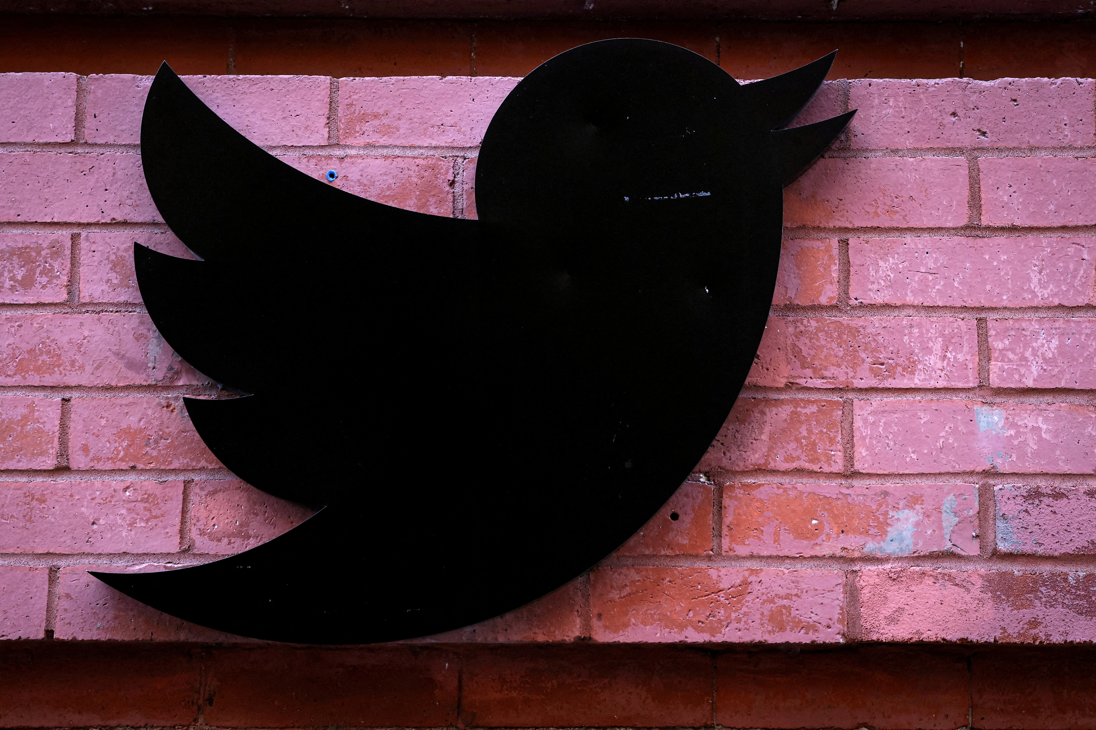 The Twitter logo is seen outside the offices in New York