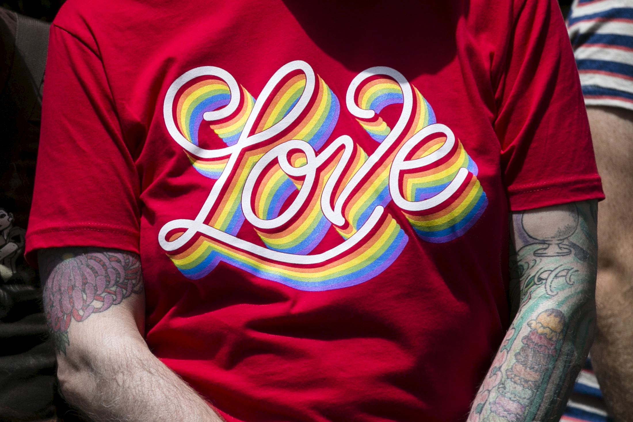 FILE PHOTO - A spectator wears a shirt with the word 'LOVE' on it while watching the San Francisco gay pride parade, California
