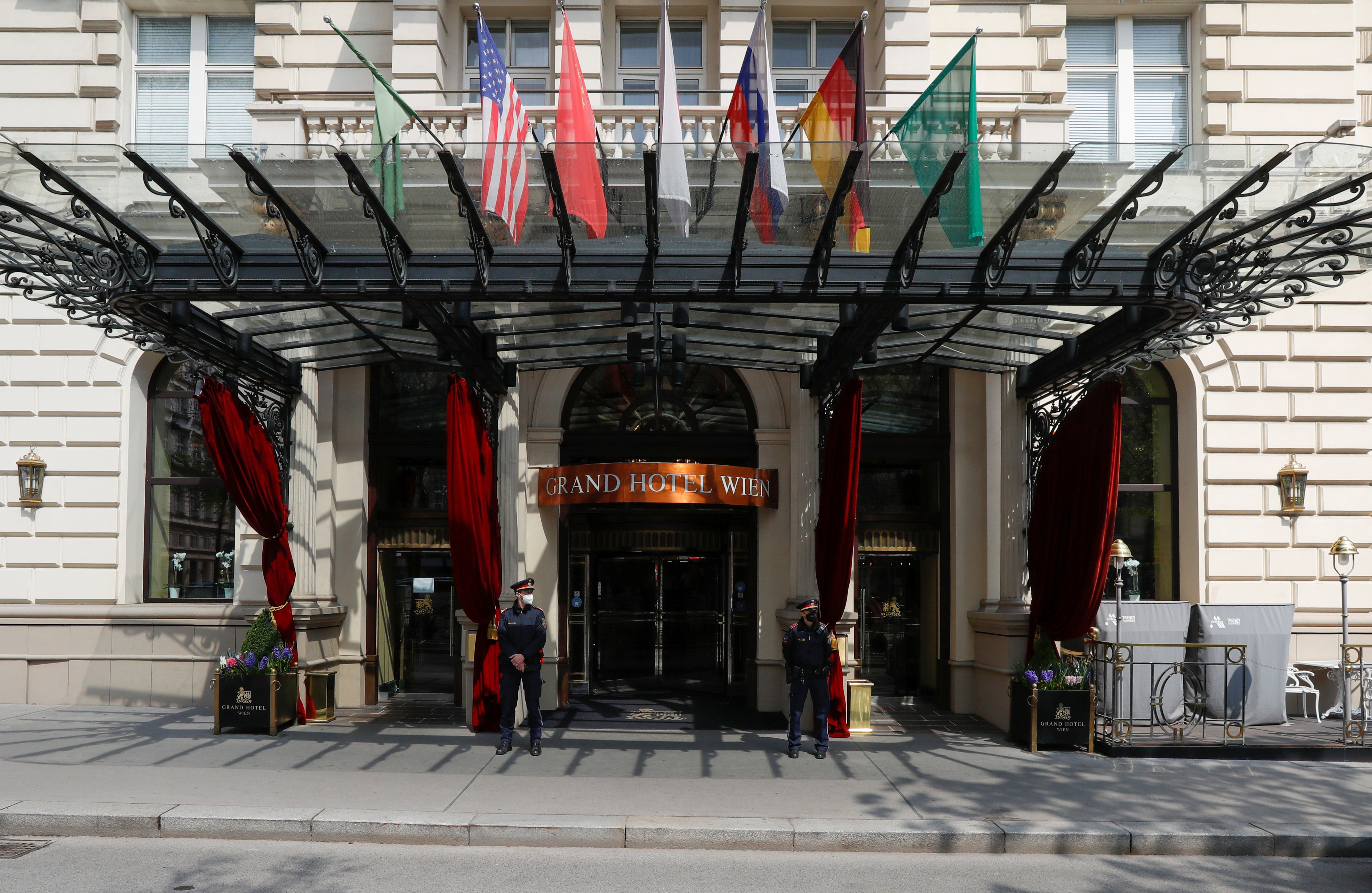 Police stand outside a hotel where a meeting of the Joint Commission of the Joint Comprehensive Plan of Action (JCPOA), or Iran nuclear deal, is held in Vienna, Austria, April 20, 2021. REUTERS/Leonhard Foeger