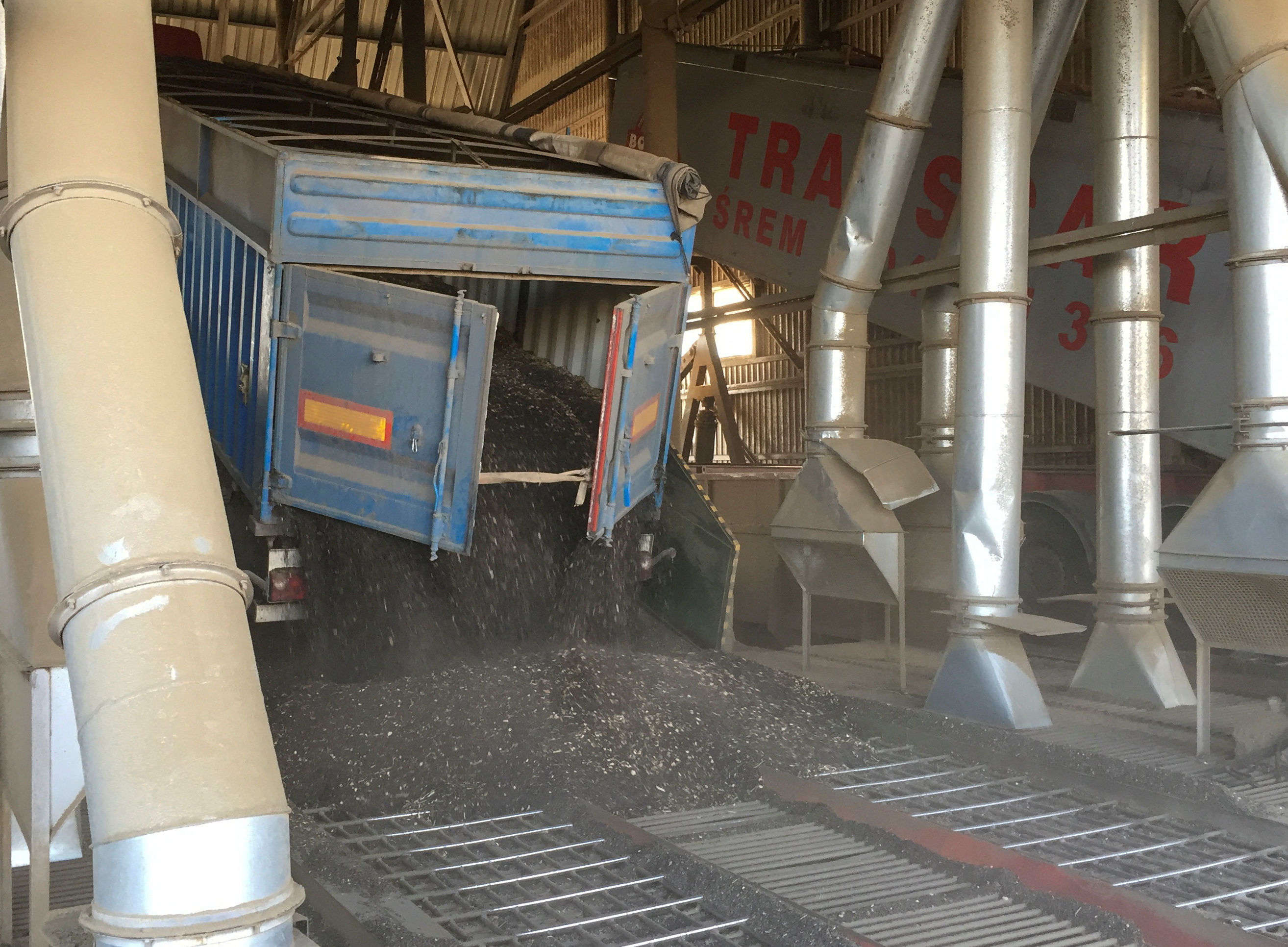 A truck unloads sunflower seeds at an Allseeds oil extraction plant in Yuzhne, Ukraine