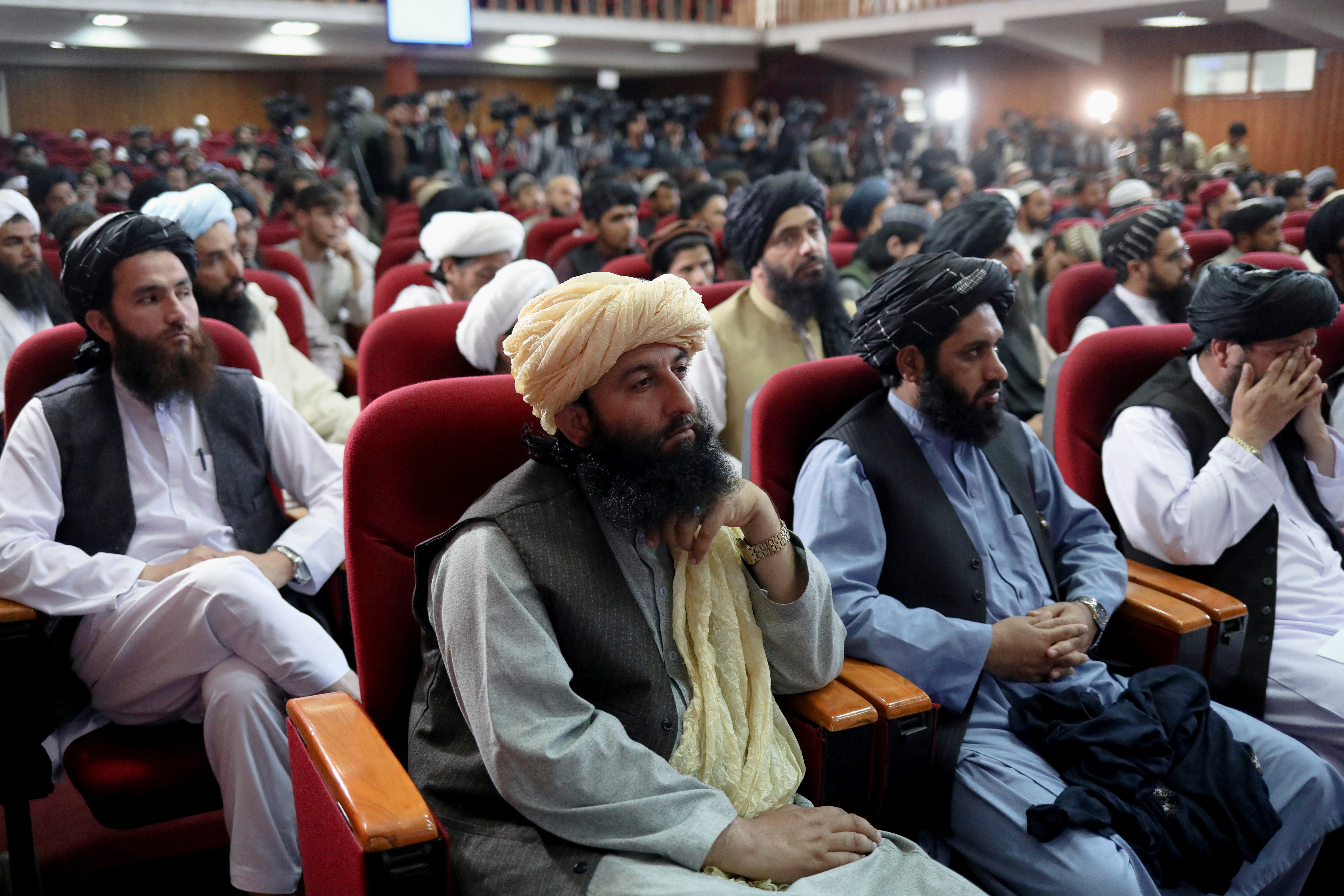 Members of the Taliban attend the news conference about a new command of hijab by Taliban leader Mullah Haibatullah Akhundzada, in Kabul