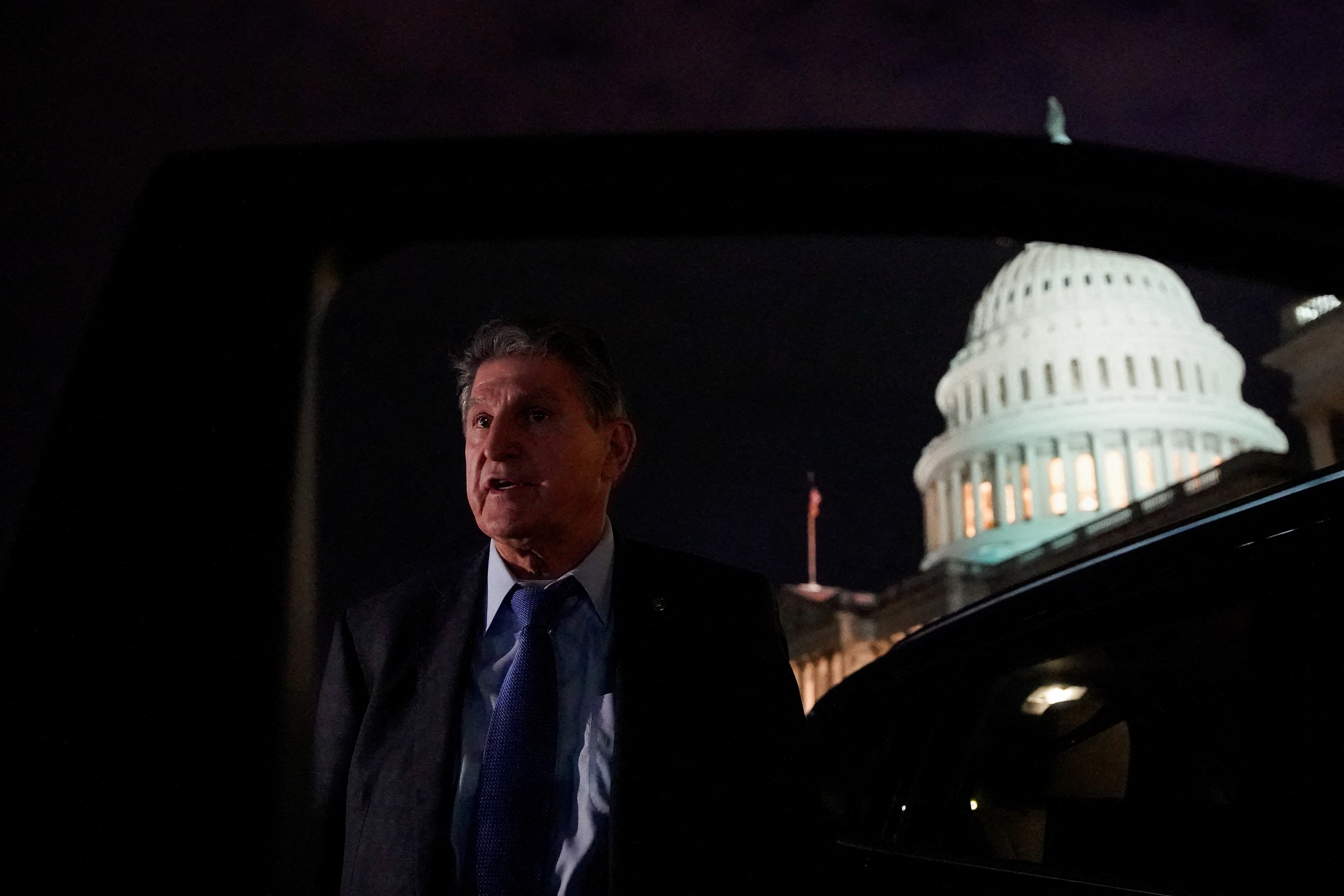 U.S. Senator Joe Manchin (D-WV) talks to reporters as he leaves the U.S. Capitol in Washington