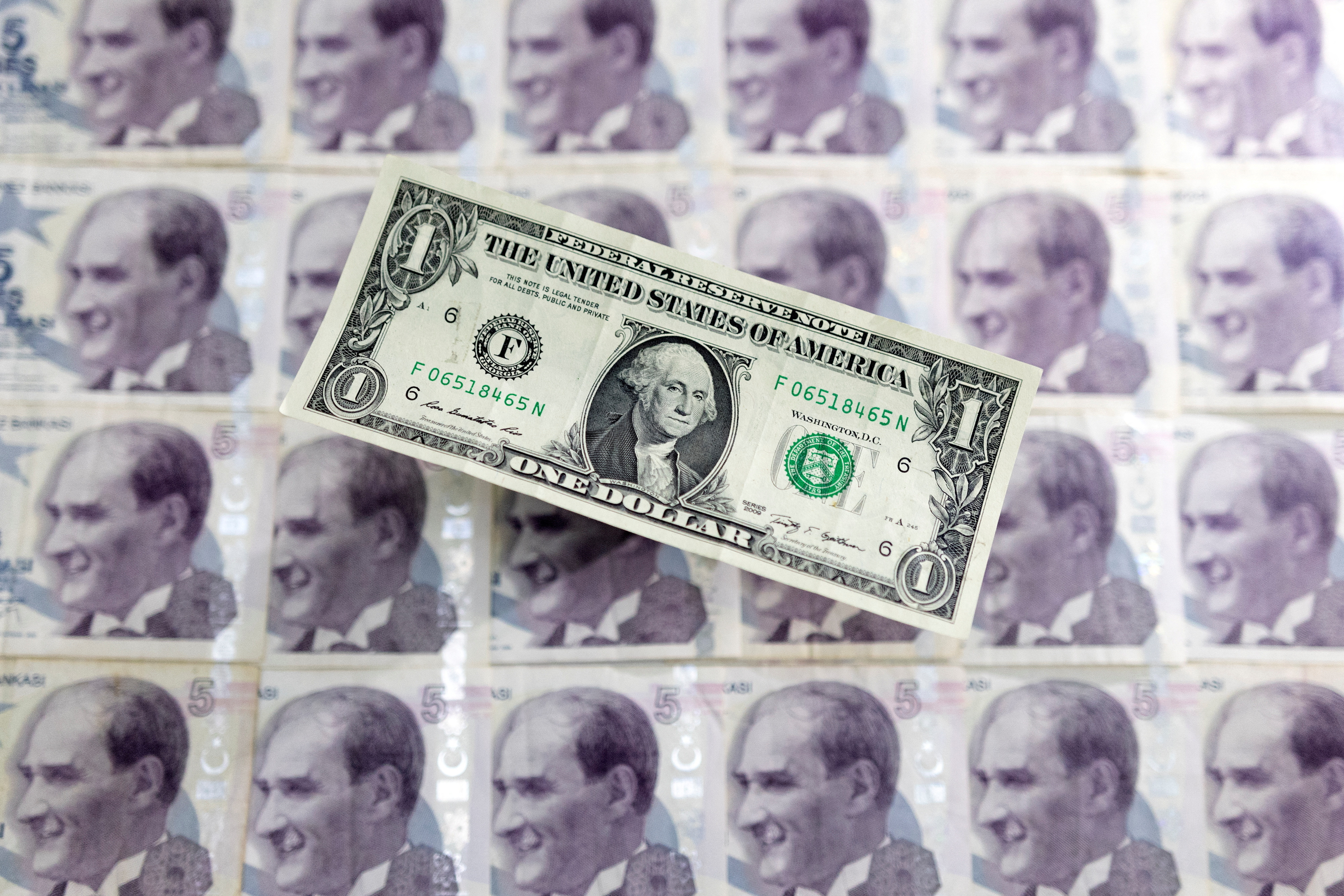 Illustration shows U.S. dollar and Turkish Lira