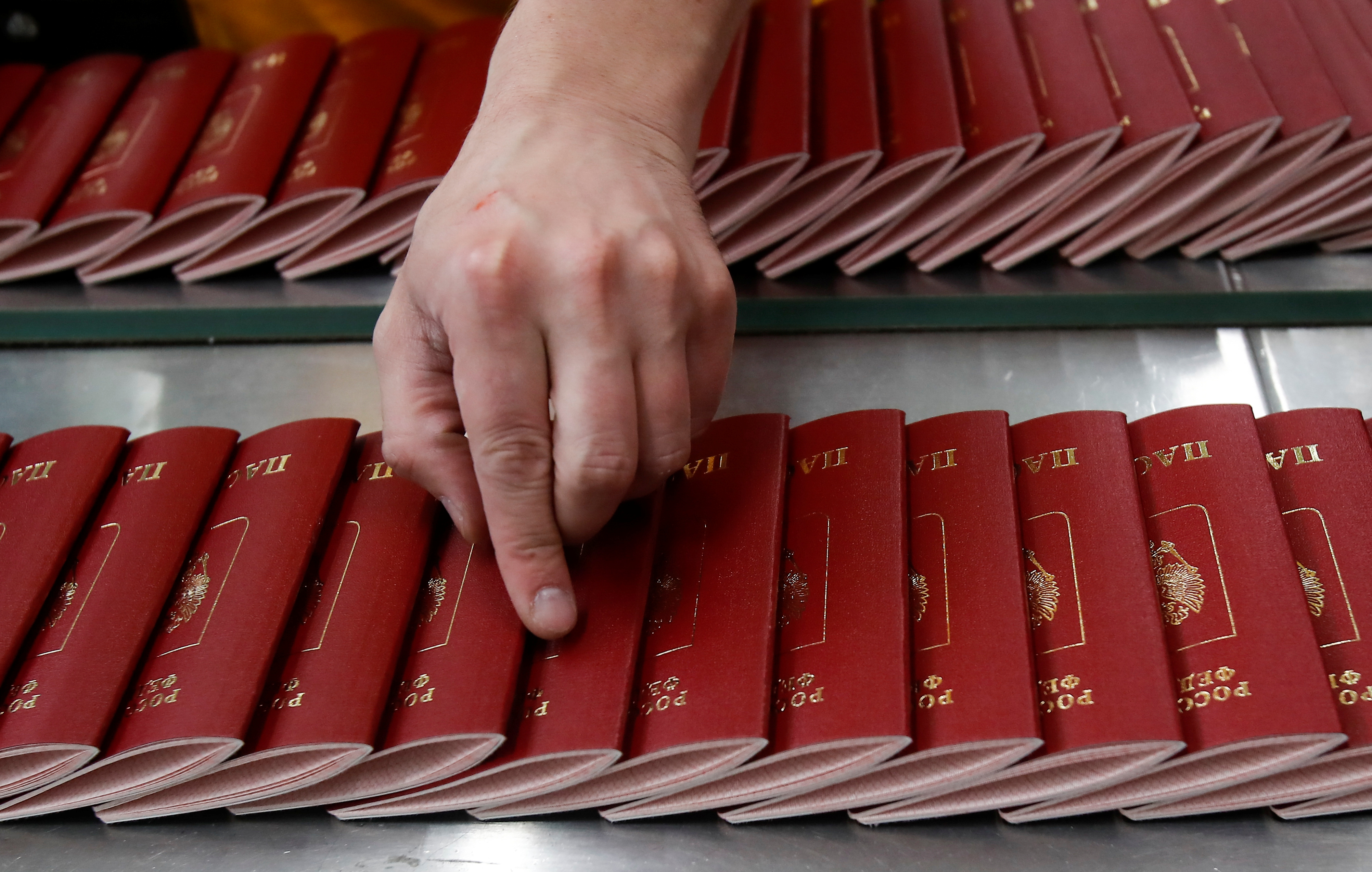 Russian passports are pictured during production at Goznak printing factory in Moscow