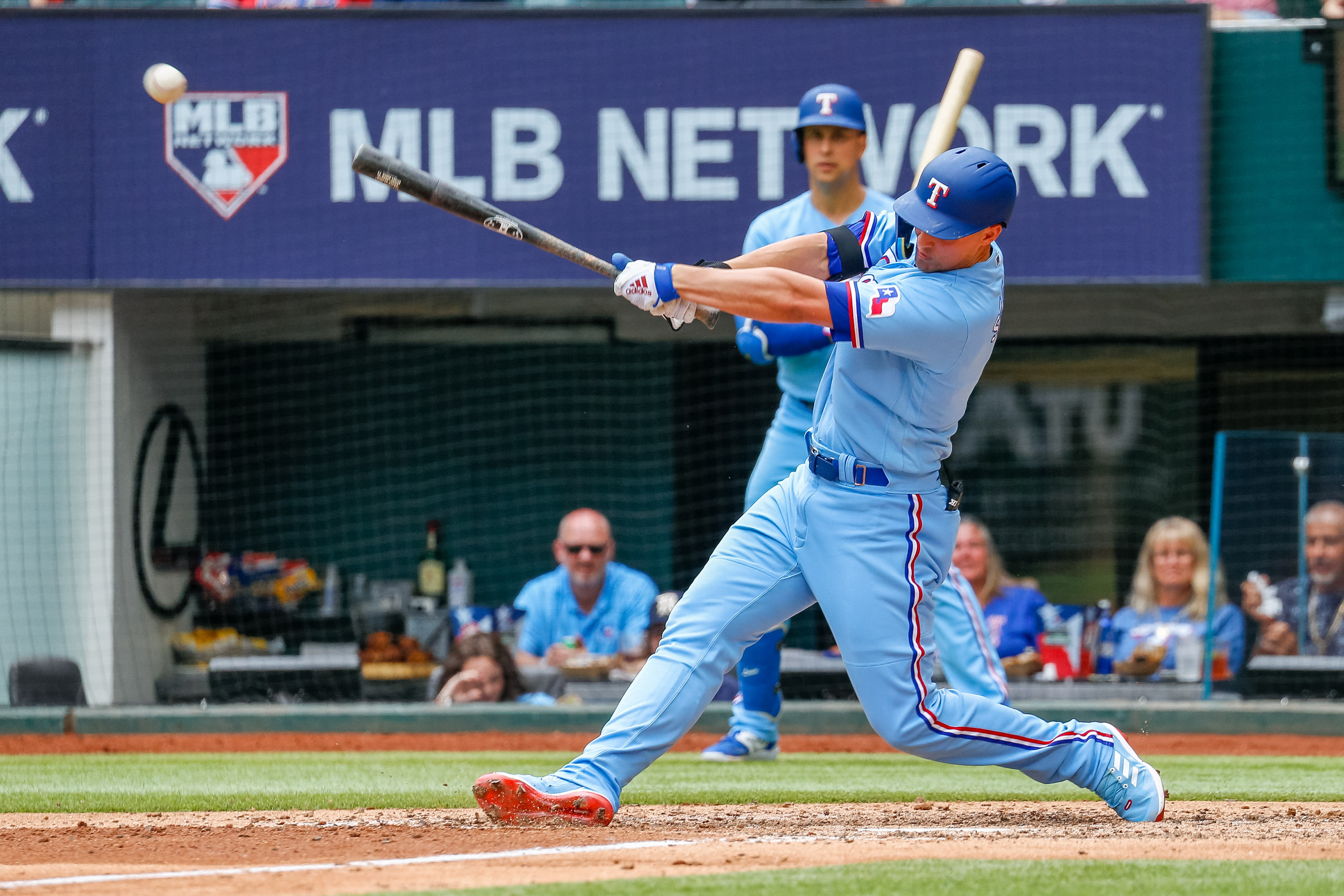 Rangers flex muscles in 13-3 rout to sweep Rockies