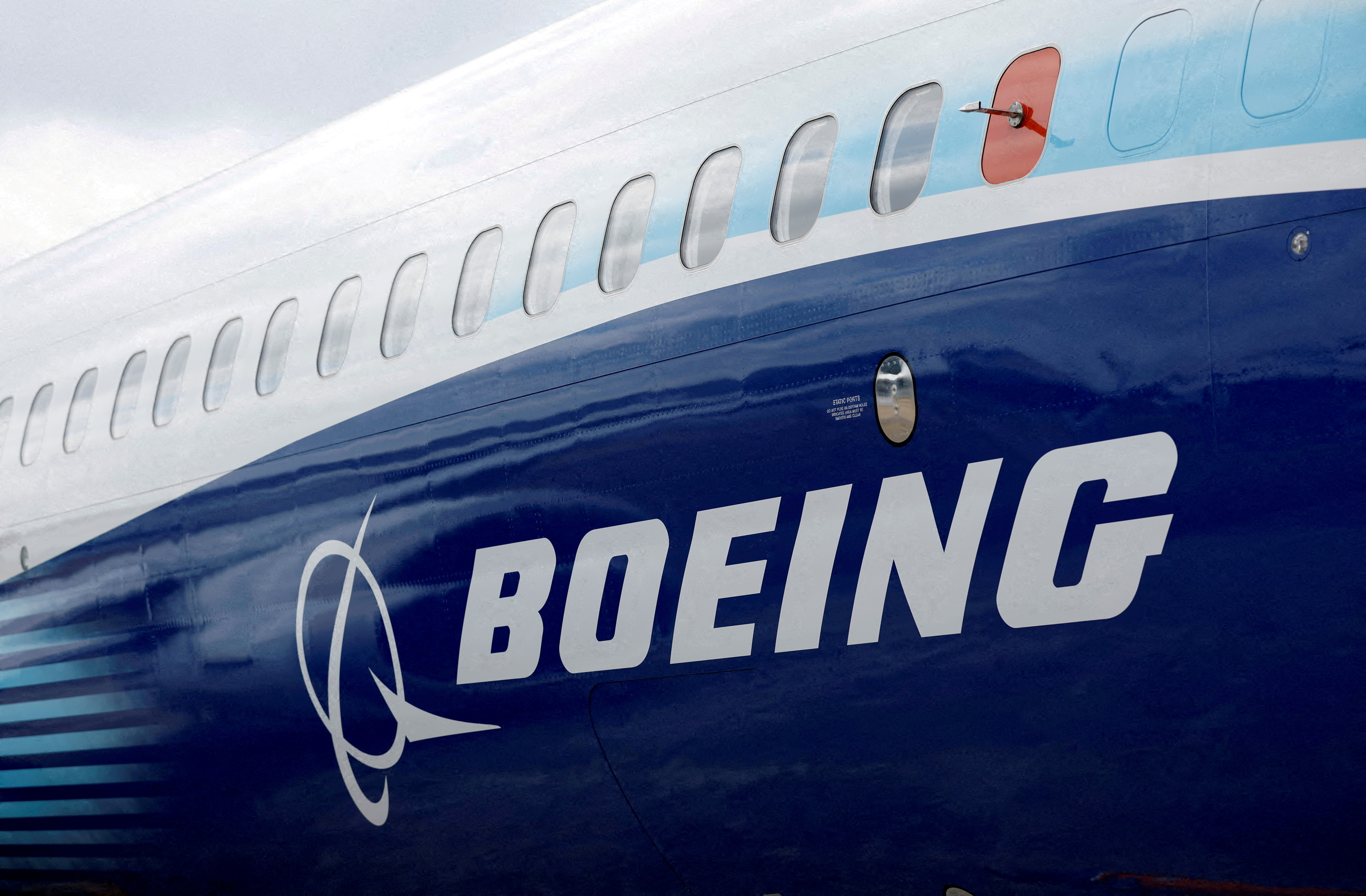 The Boeing logo is seen on the side of a Boeing 737 MAX at the Farnborough International Airshow