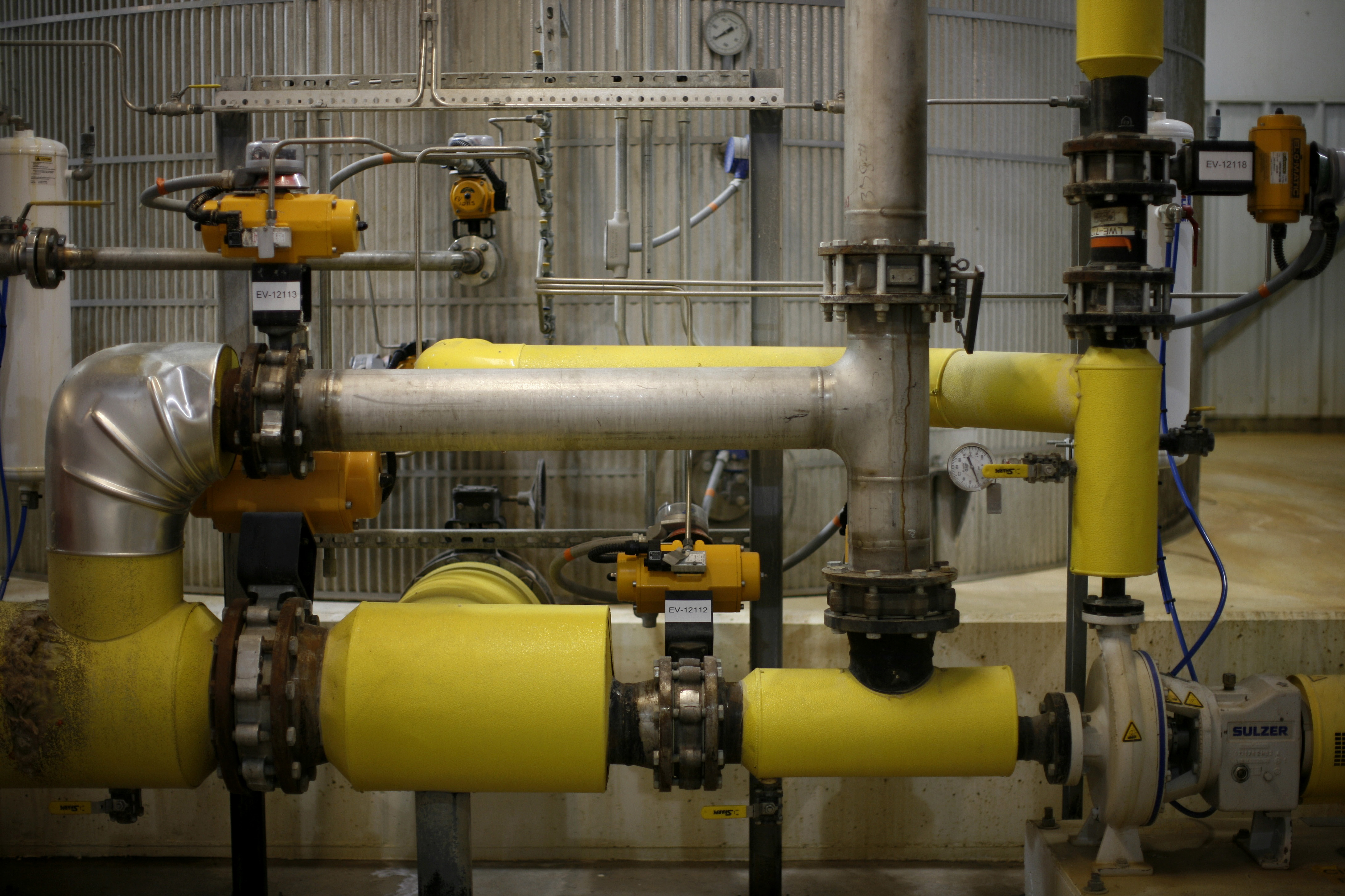 A network of pipes and tanks convert corn to ethanol at the Lincolnway Energy plant in Nevada, Iowa