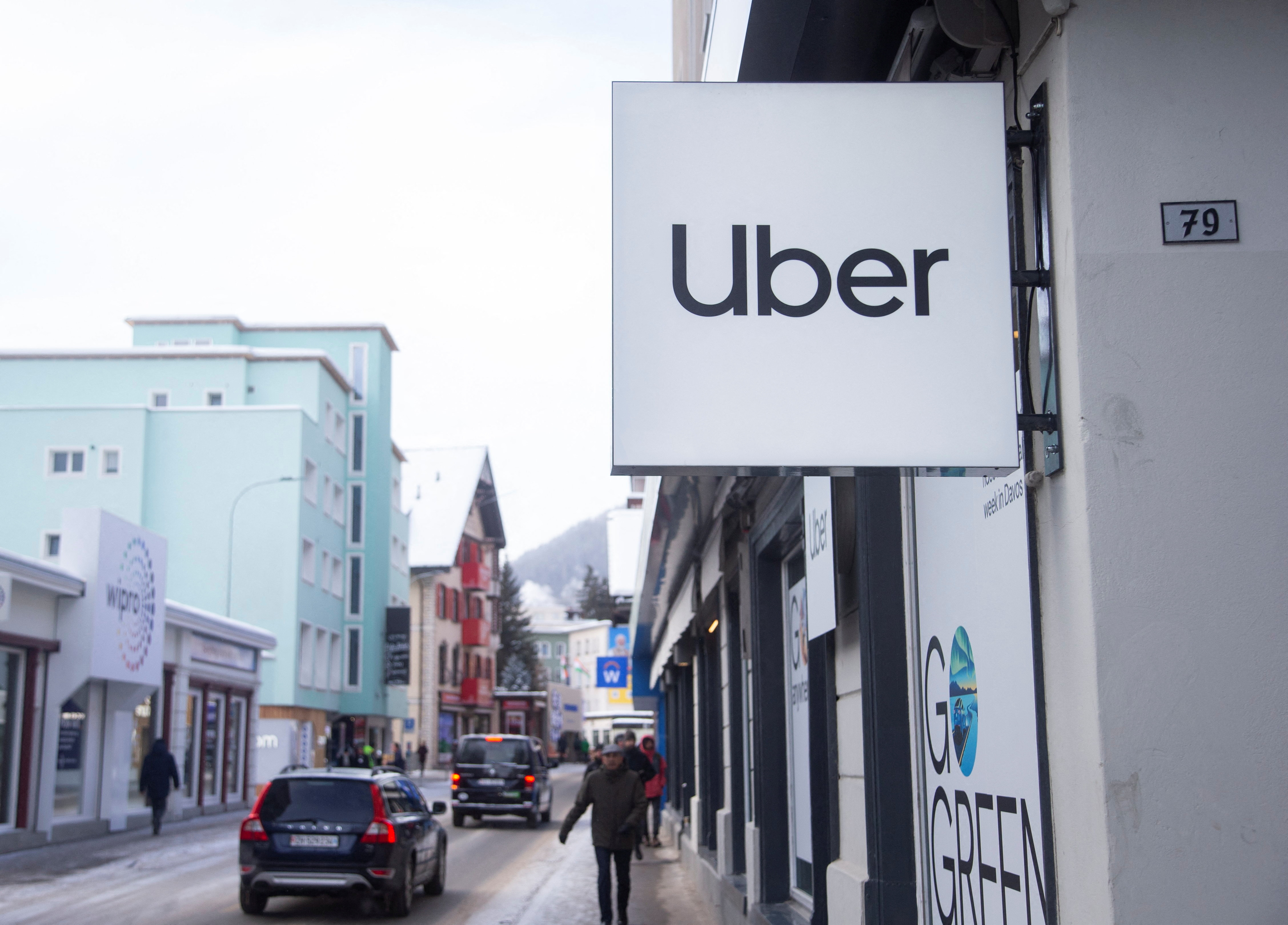 Logo of Uber is seen at a temporary showroom during the World Economic Forum in Davos