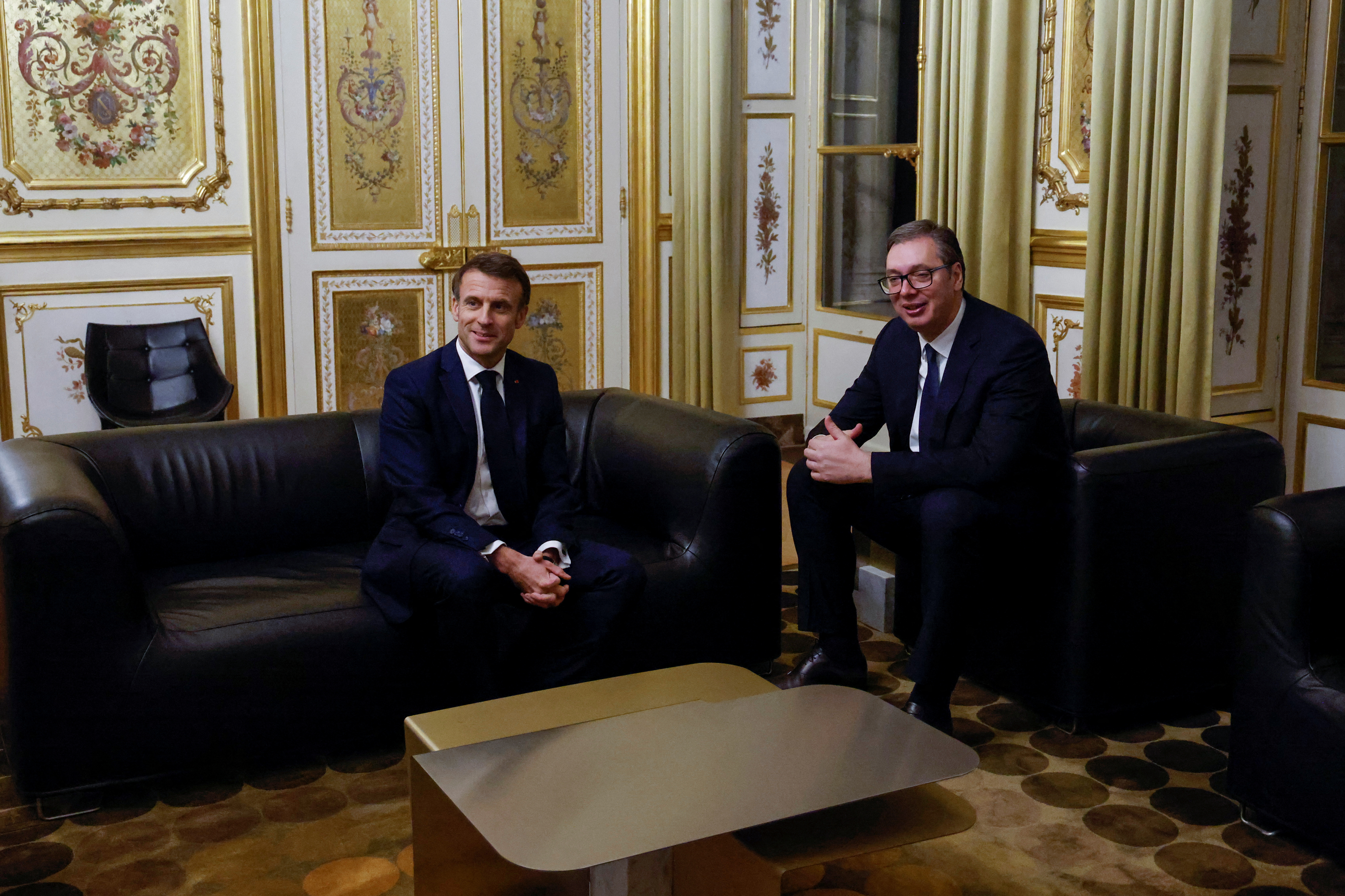 French President Emmanuel Macron meets with Serbian President Aleksandar Vucic on the sidelines of the Paris Peace Forum