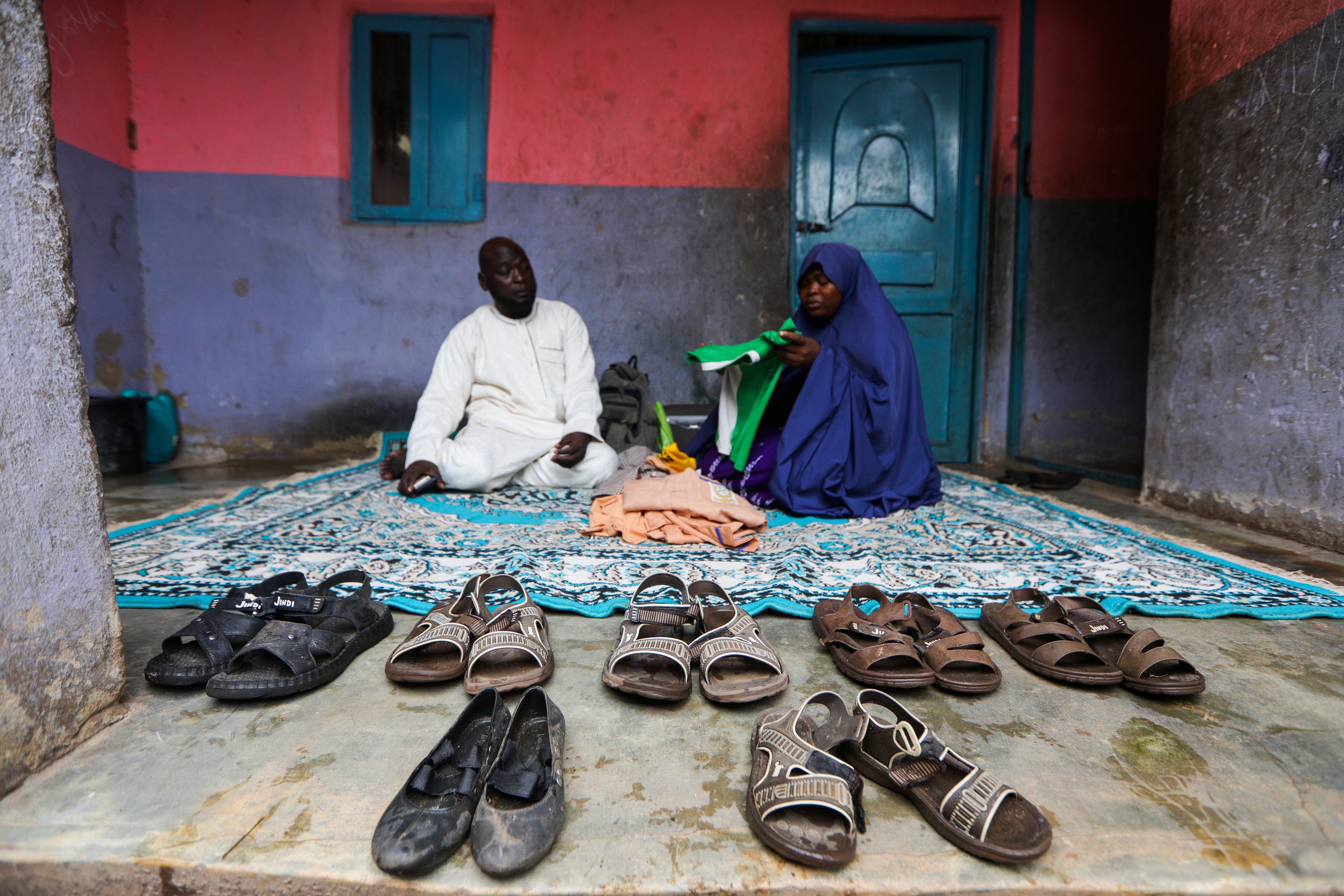 Footwear of seven of the children of Abubakar Adam that were kidnapped are seen at his house in Tegina, Niger State