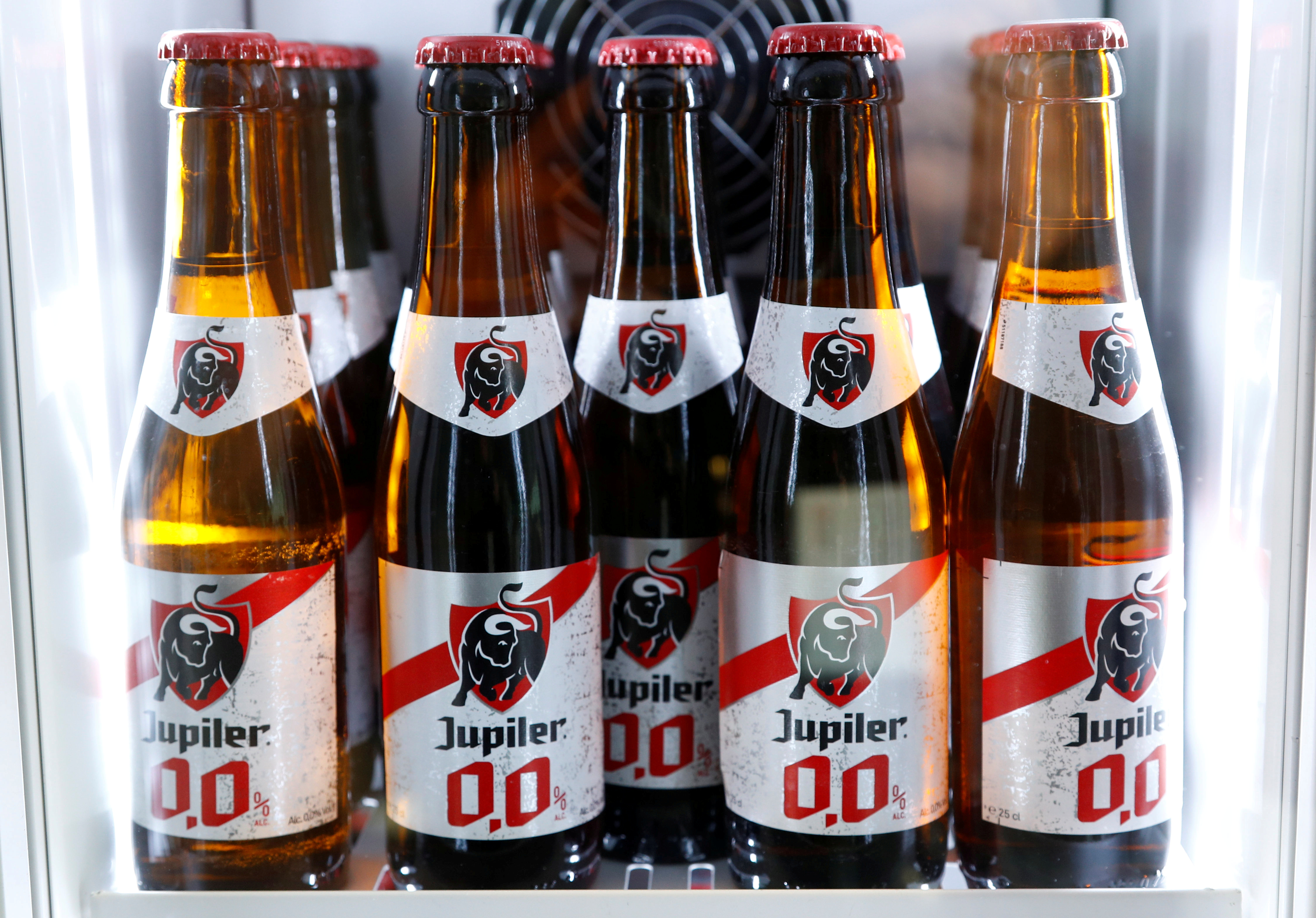 Non-alcoholic Jupiler beer bottles are seen at the headquarters of AB InBev in Leuven