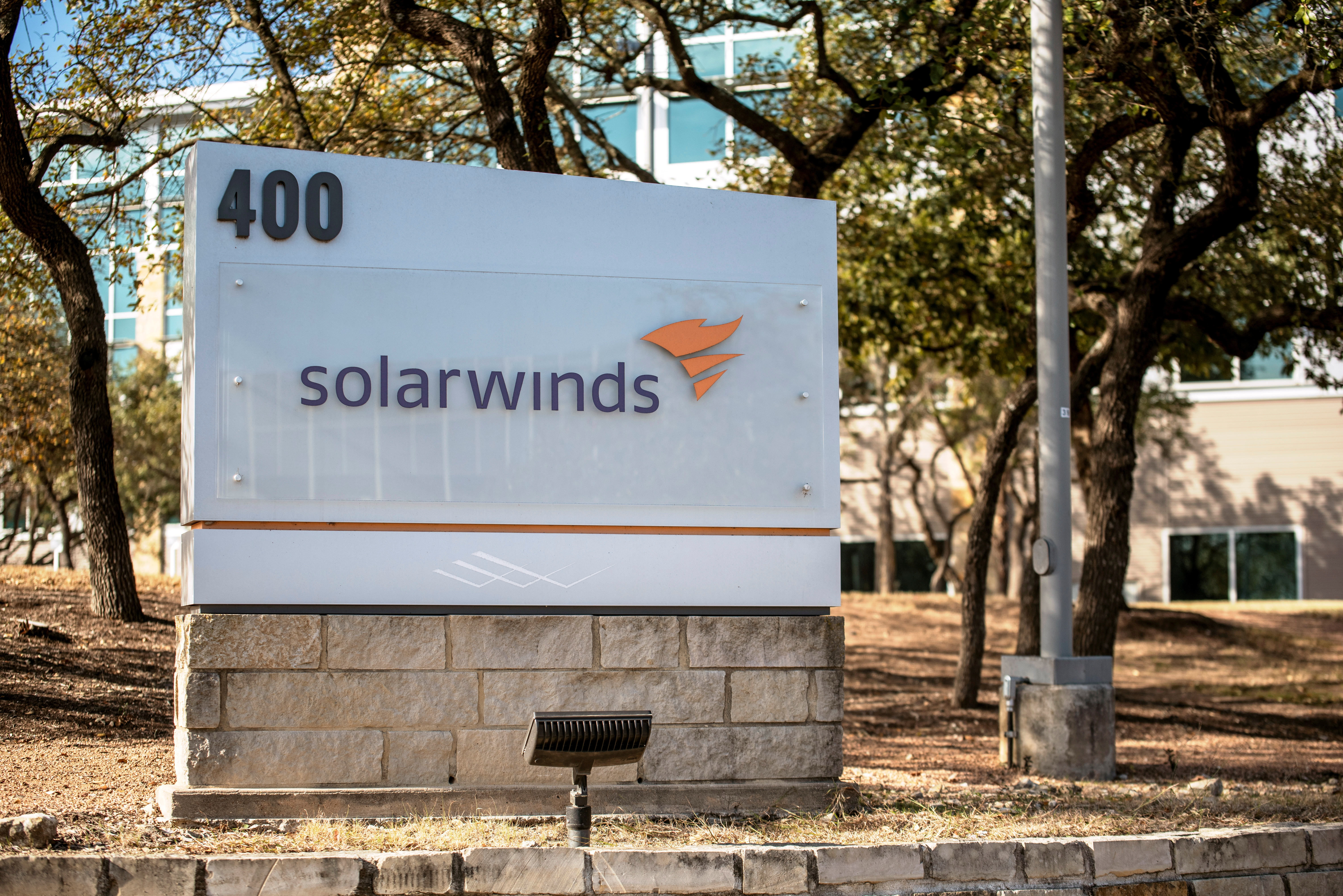A SolarWinds sign is seen outside its headquarters in Austin, Texas, U.S., December 18, 2020. REUTERS/Sergio Flores