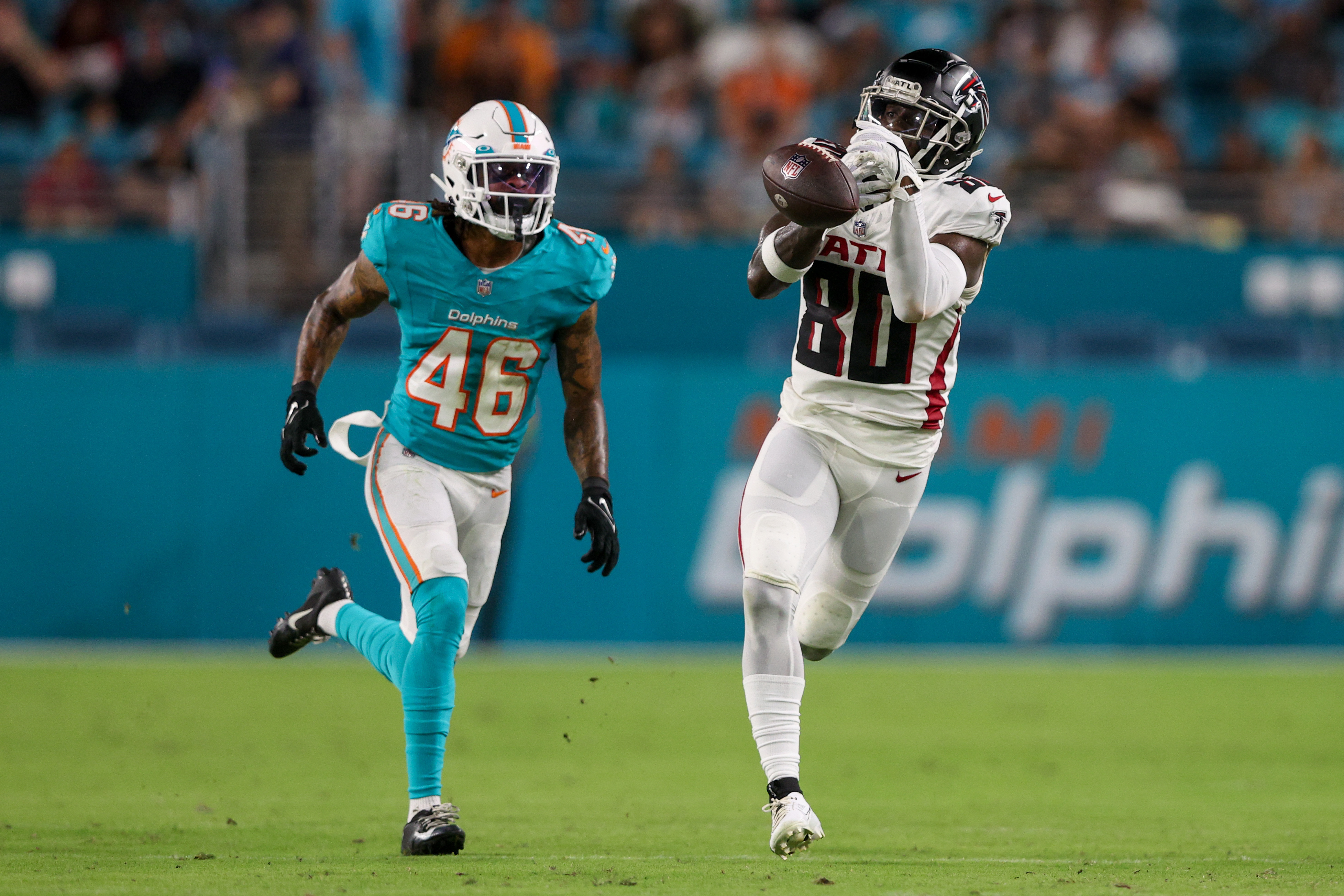 Atlanta Falcons running back Godwin Igwebuike sprints through Miami  Dolphins for an 11-yard TD run