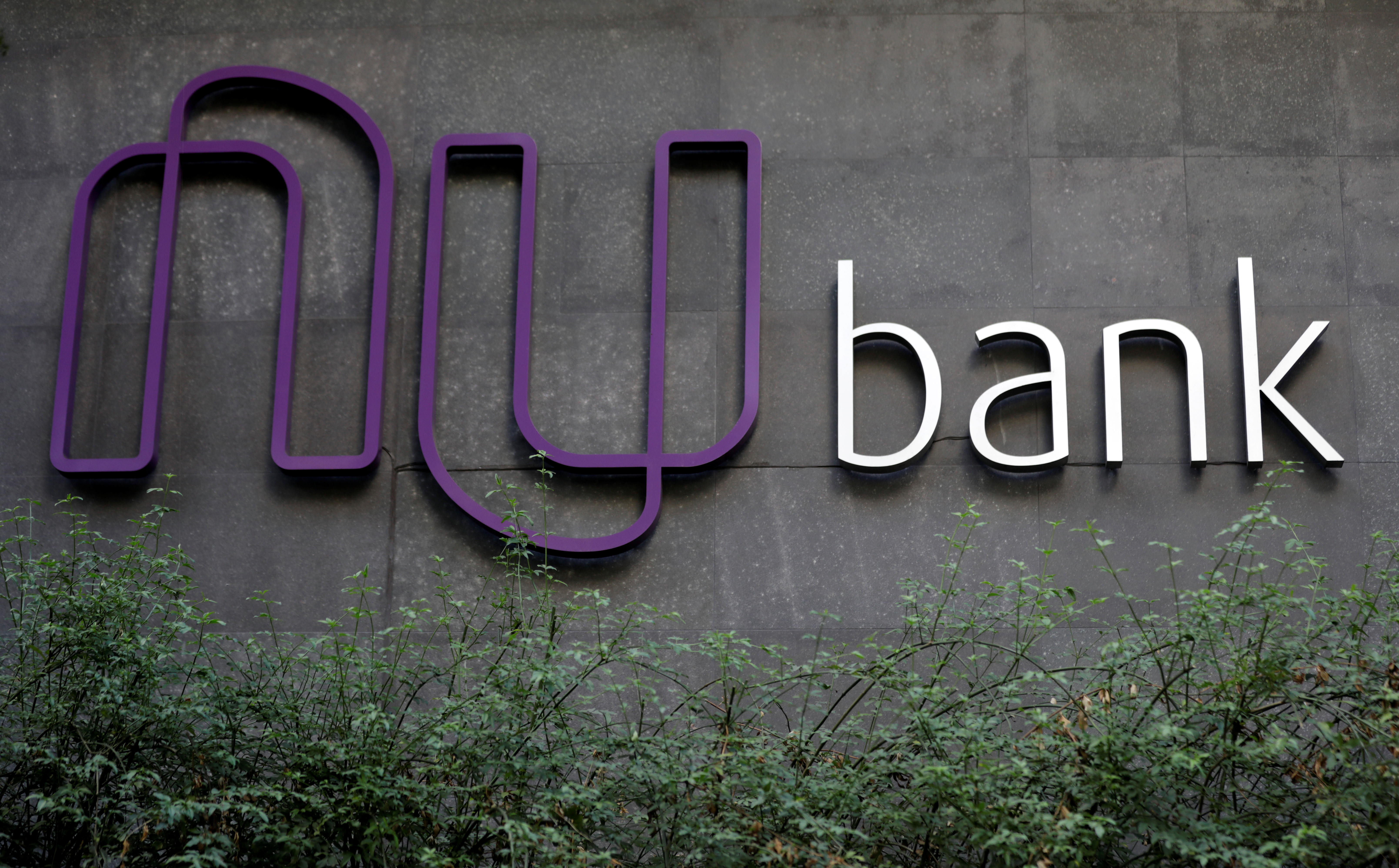 The logo of Nubank, a Brazilian FinTech startup, is pictured at the bank's headquarters in Sao Paulo, Brazil June 19, 2018. Picture taken June 19, 2018. REUTERS/Paulo Whitaker/Files