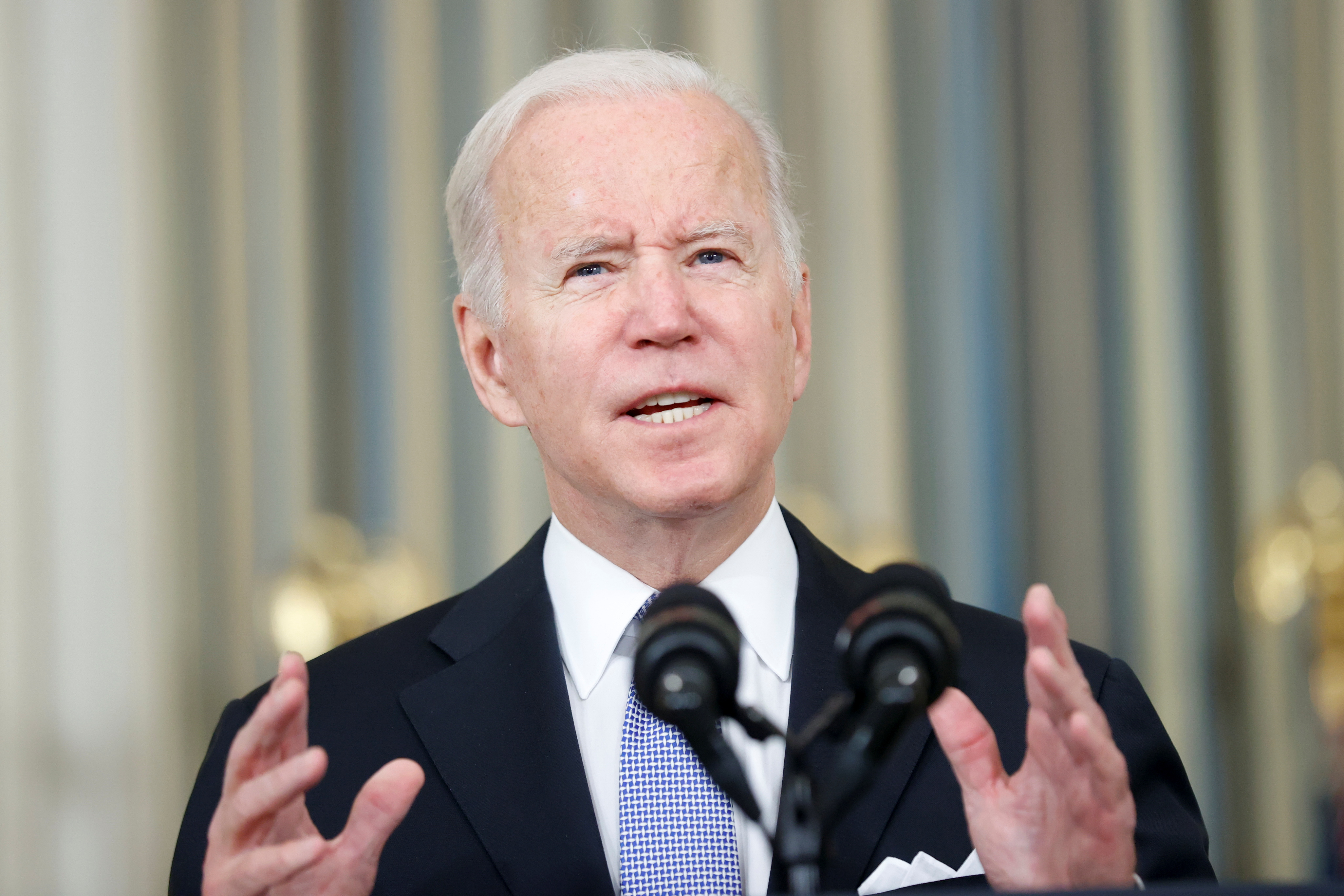U.S. President Biden speaks during a news conference, in Washington