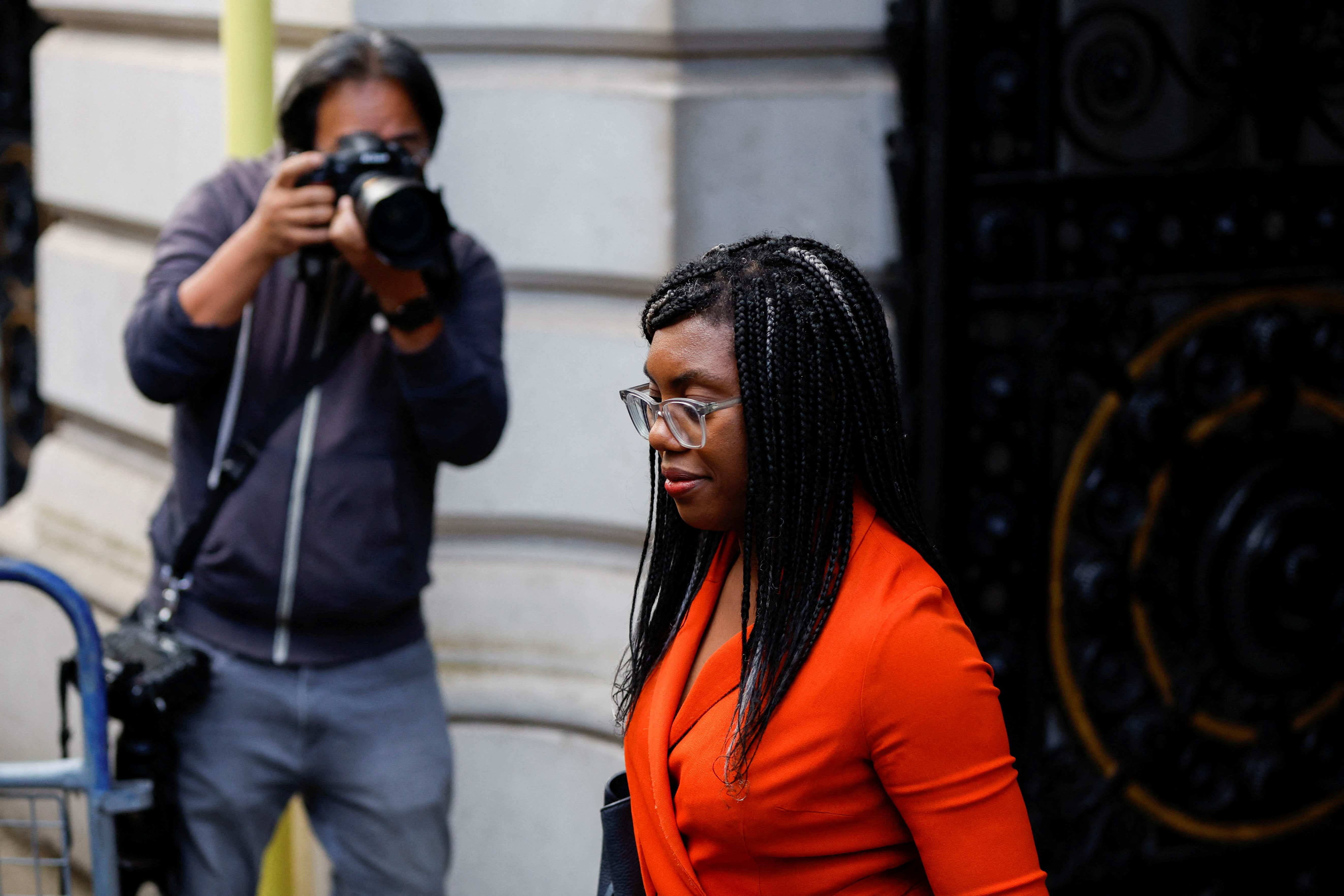 Kemi Badenoch walks outside Cabinet building, in London