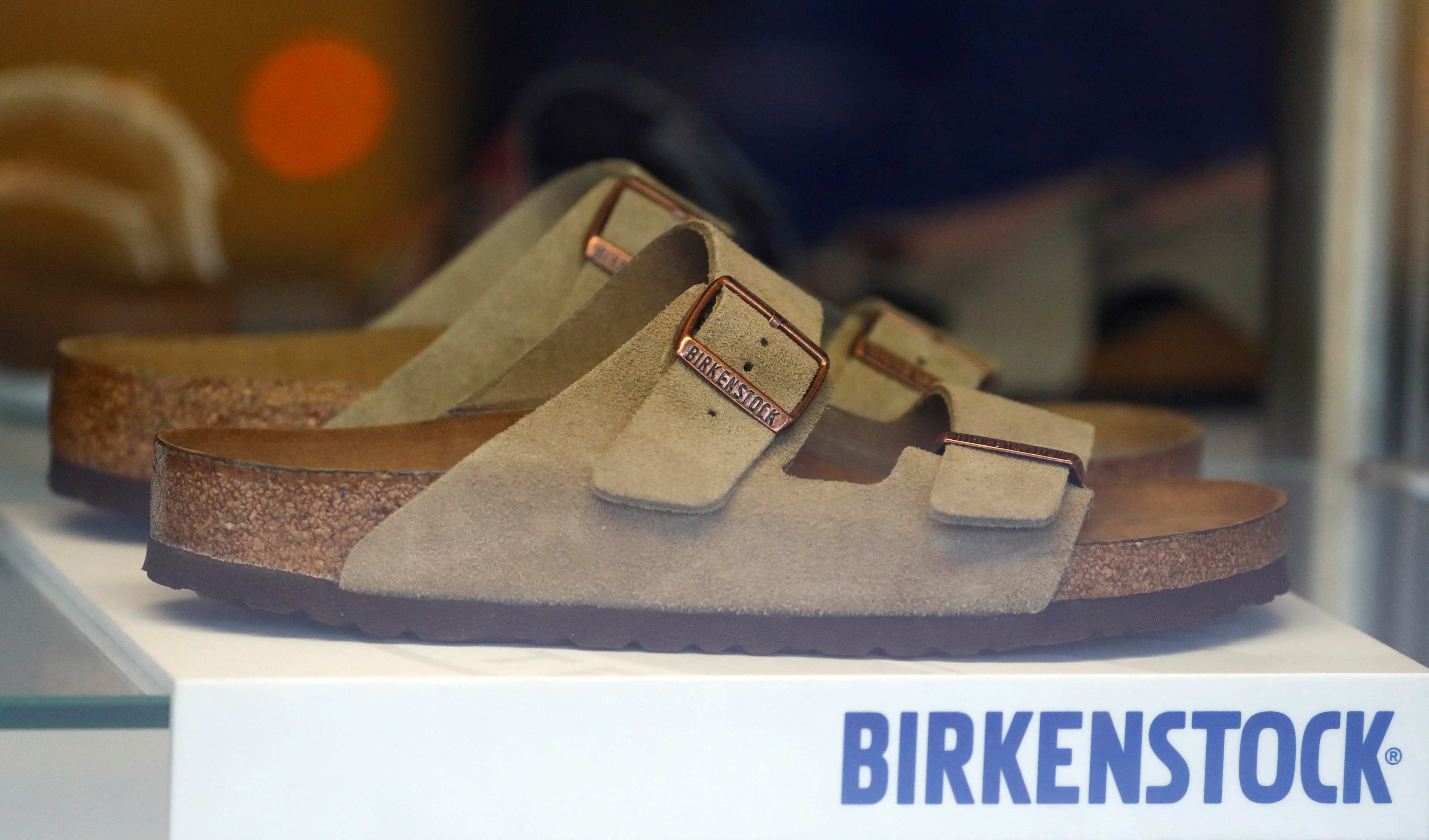 A pair of shoes is pictured in a window of a Birkenstock footwear store in Berlin