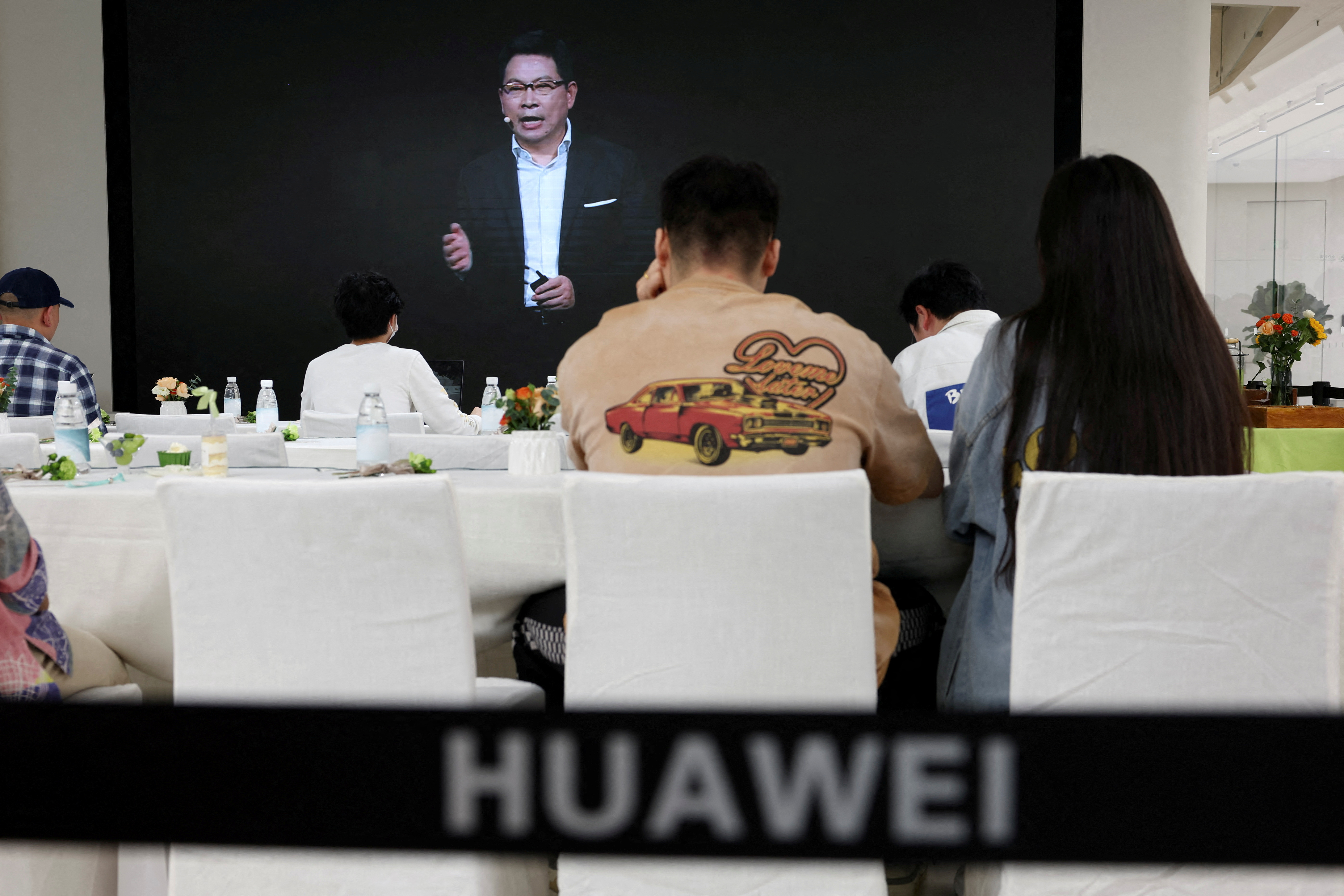 Huawei's Richard Yu on a screen at a flagship store in Beijing