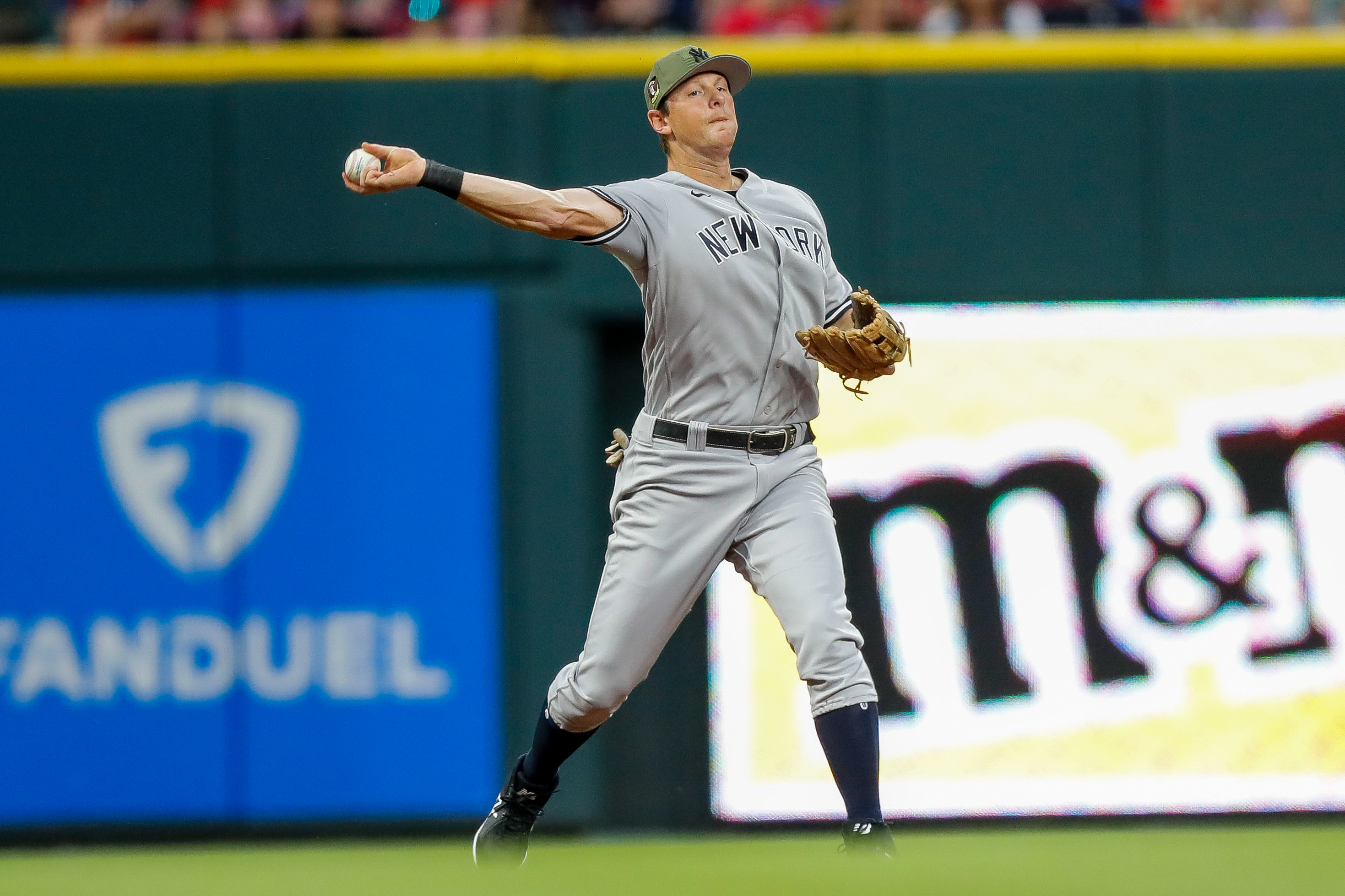 New York Yankees right fielder Aaron Judge (99) throws a ball to