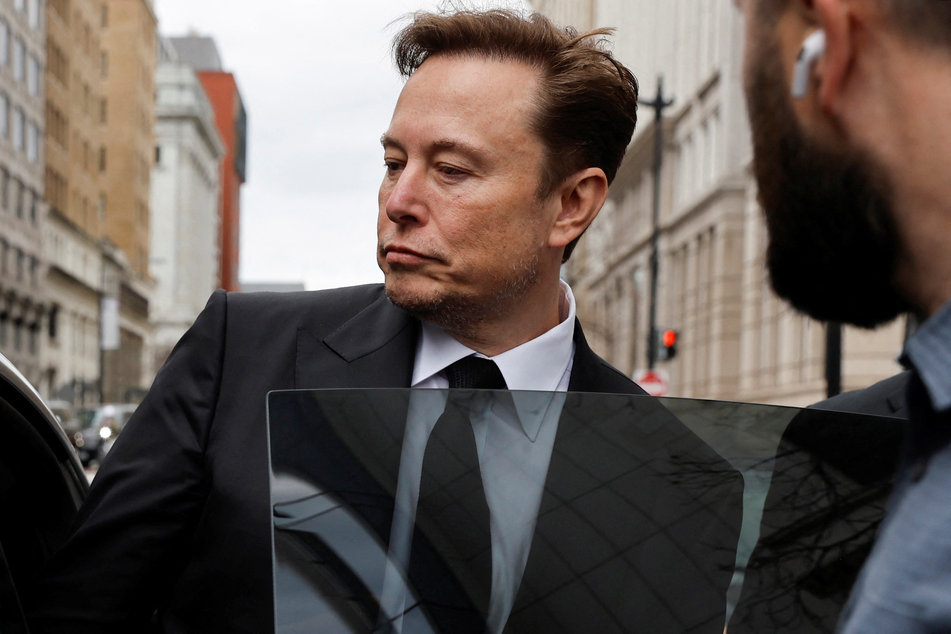 Elon Musk accuses media of racism after newspapers drop 'Dilbert' cartoon |  Reuters