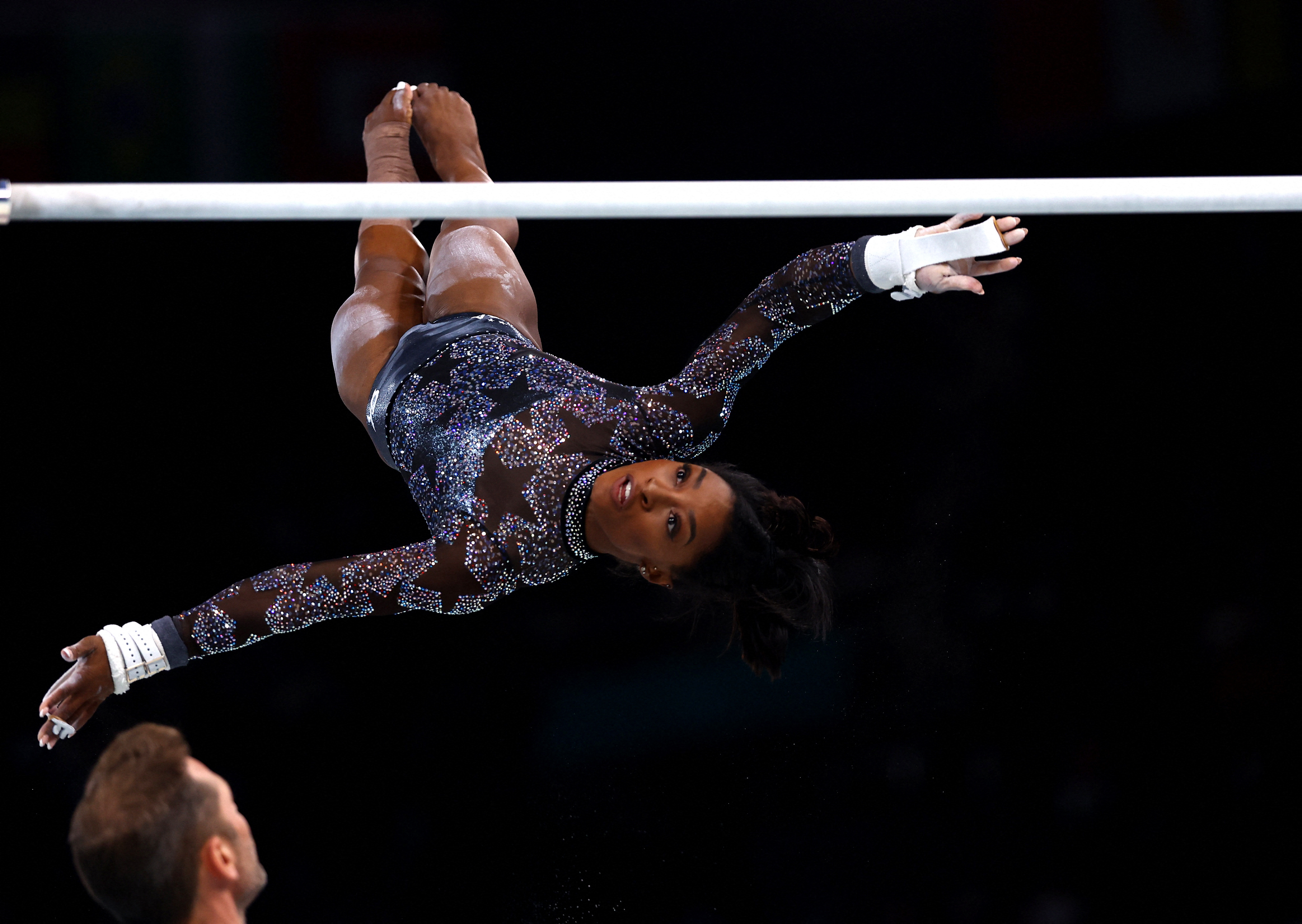 Olympics-Gymnastics-Simone Biles fights through calf pain in Paris Olympic  debut | Reuters