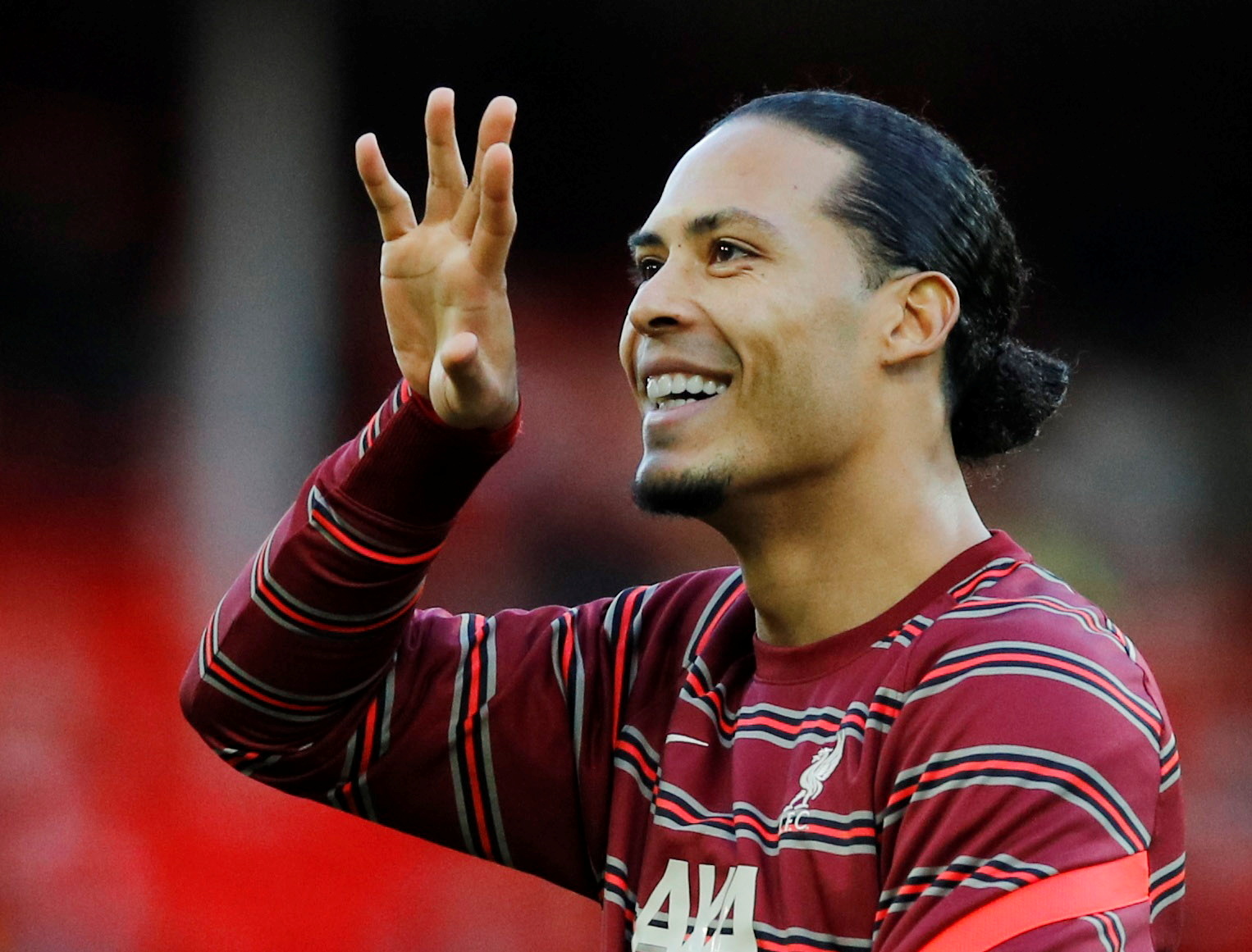 Soccer Football - Premier League - Liverpool v Southampton - Anfield, Liverpool, Britain - November 27, 2021 Liverpool's Virgil van Dijk applauds fans during the warm up before the match REUTERS/Phil Noble 