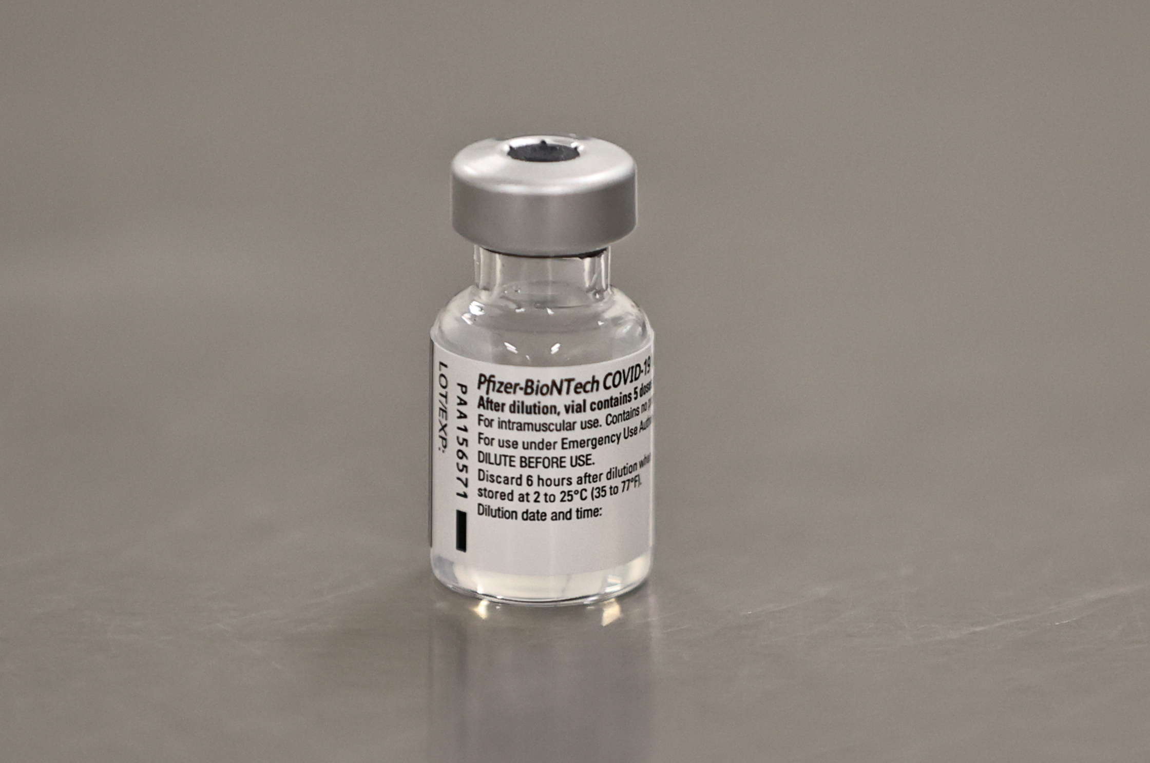 A phial of the Pfizer/BioNTech COVID-19 vaccine is seen ahead of being administered at the Royal Victoria Hospital in Belfast