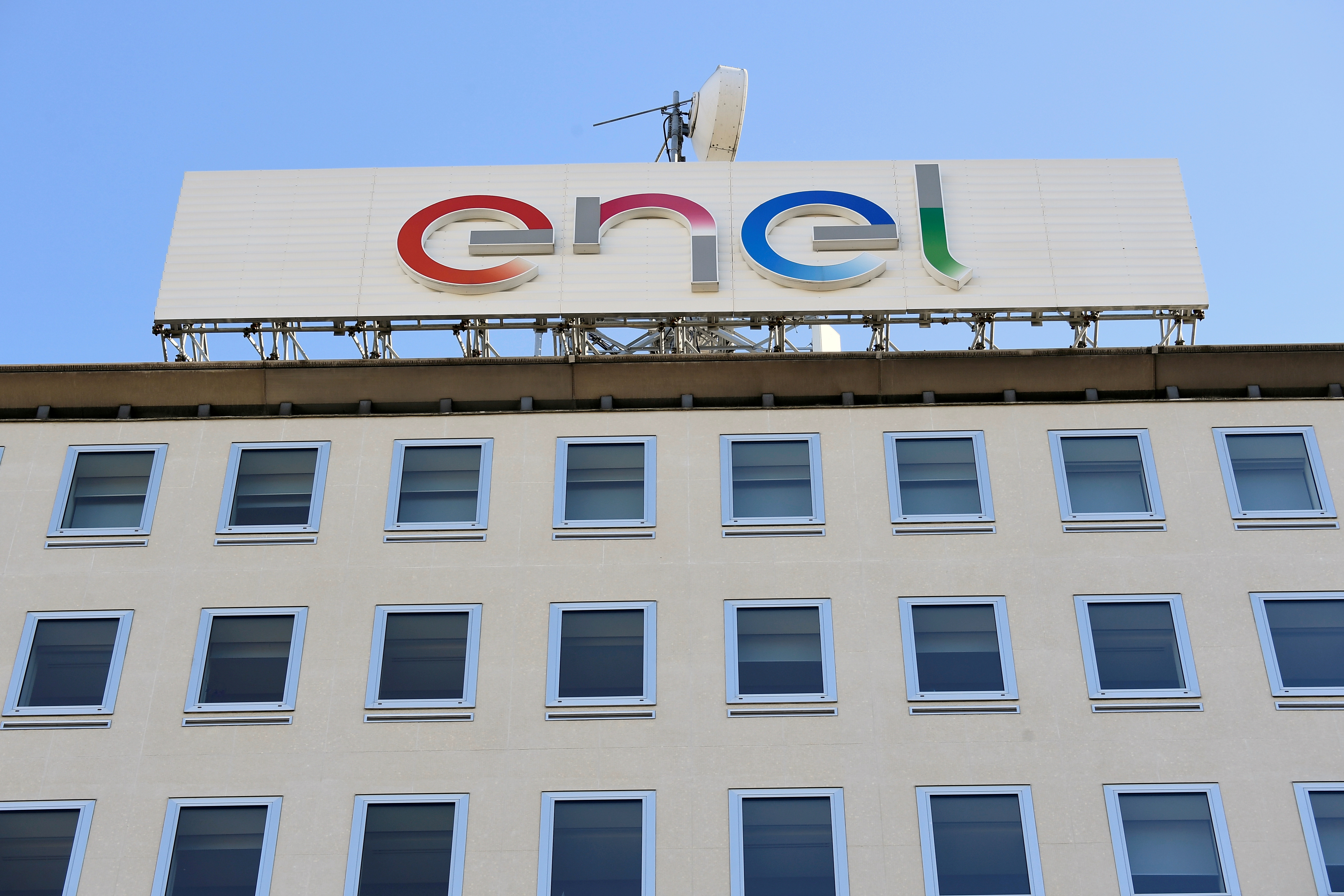 The logo of Italian multinational energy company Enel is seen at the Milan headquarters, Italy, February 5, 2020. REUTERS/Flavio Lo Scalzo