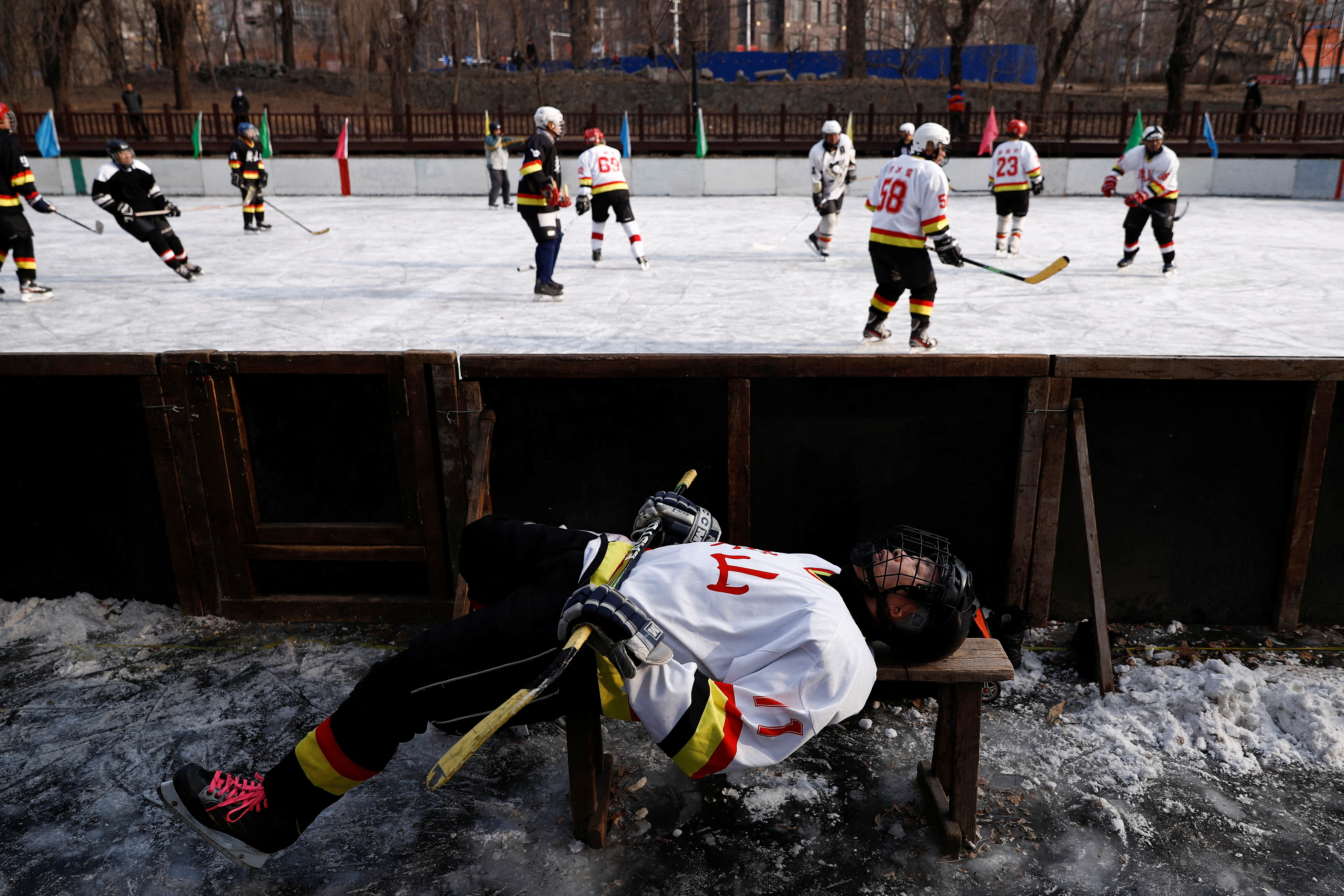 The Wider Image: On a frozen pond far from the Olympics, meet China's ice hockey veterans