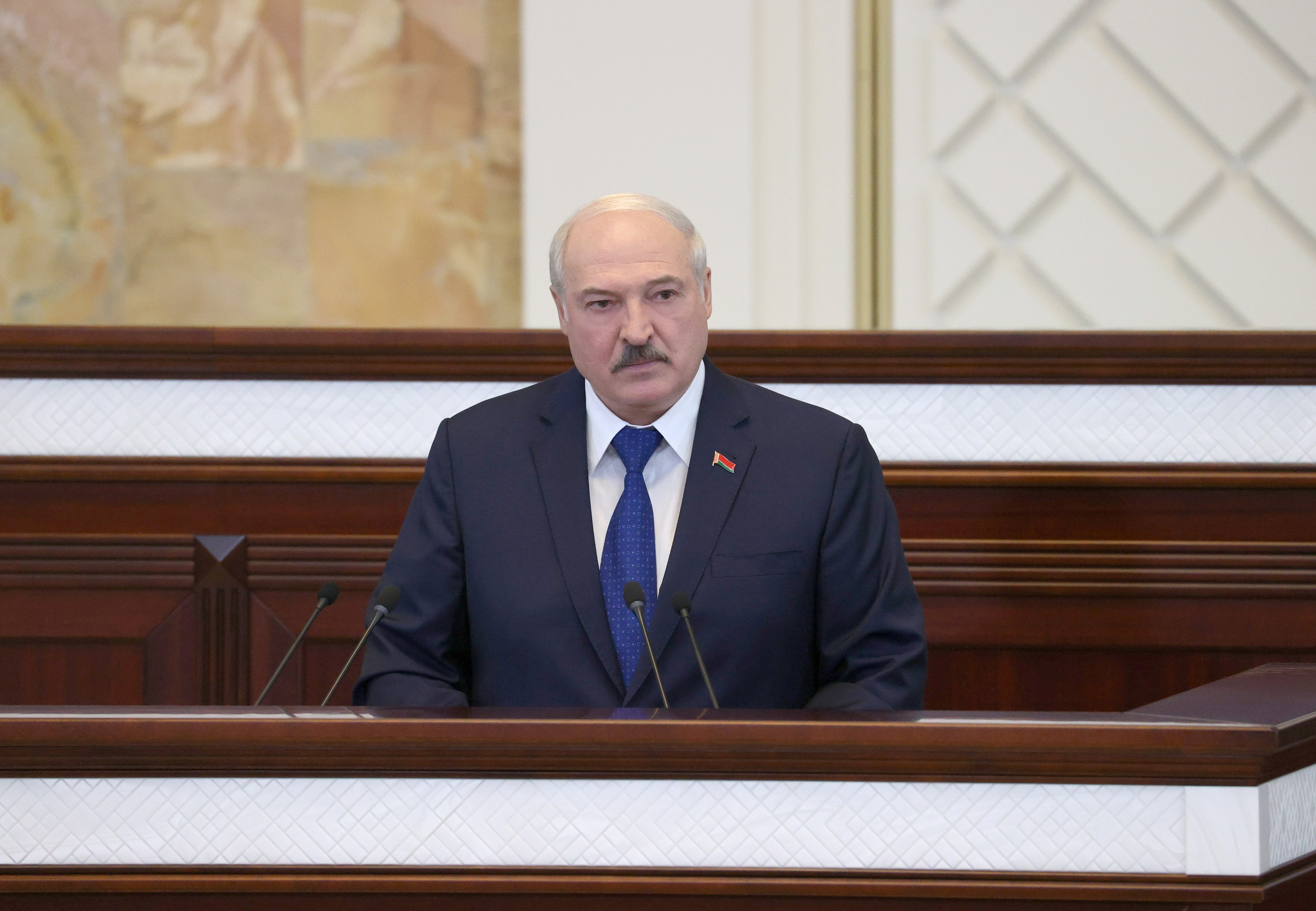 Belarusian President Alexander Lukashenko delivers a speech during a meeting in Minsk