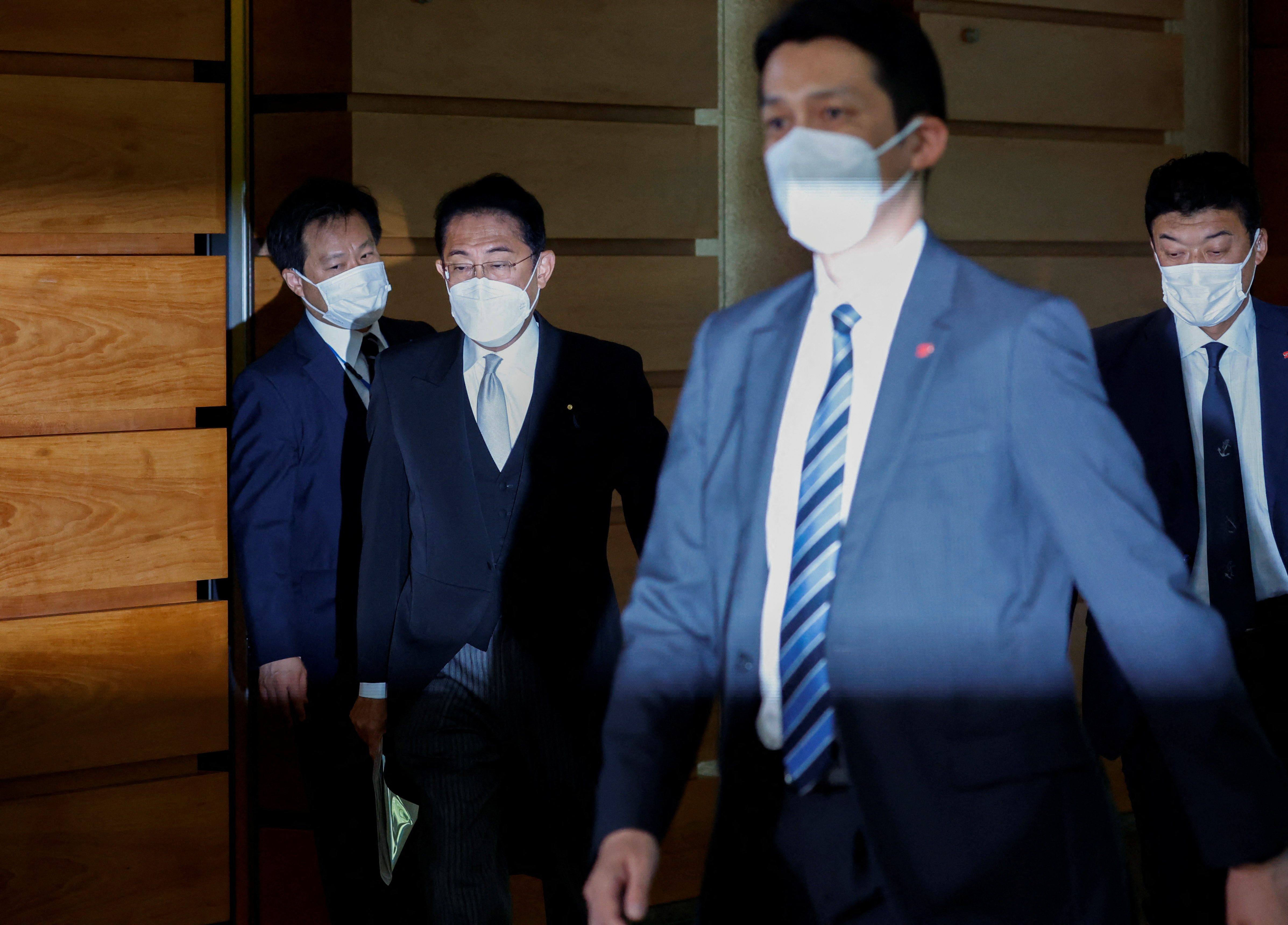 Japan's Prime Minister Fumio Kishida walks at his official residence after he held his cabinet reshuffle in Tokyo