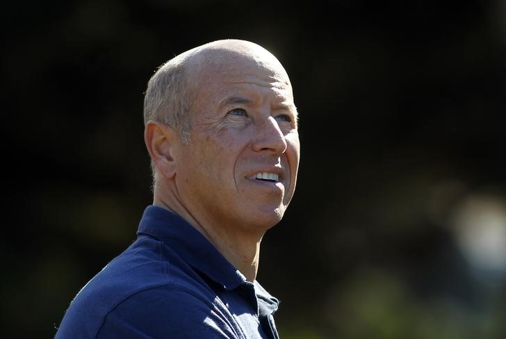 Chairman and CEO of Starwood Capital Group Sternlicht watches a tee shot during the first round of the Pebble Beach National Pro-Am golf tournament