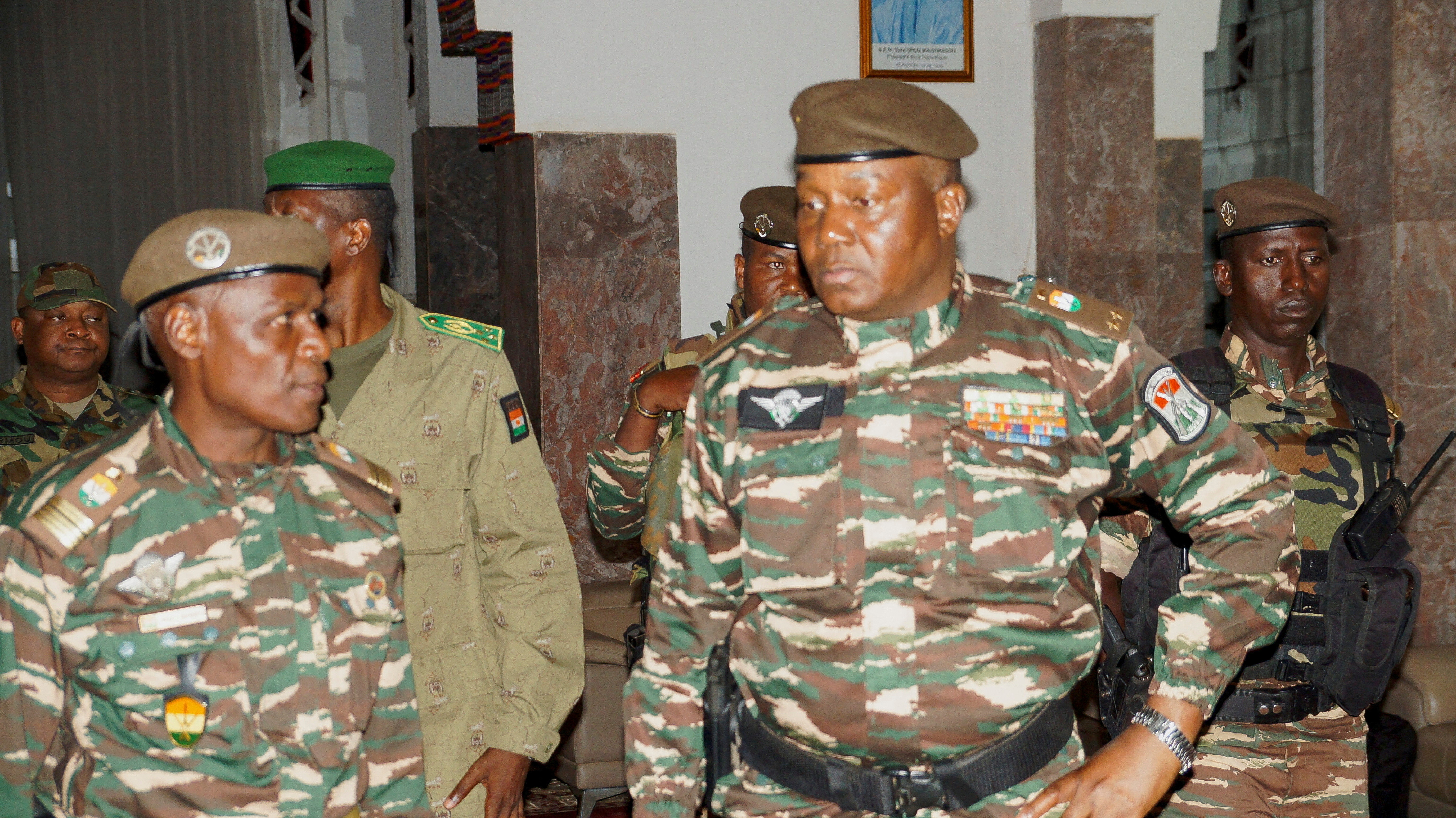 FILE PHOTO: General Abdourahmane Tiani, who was declared as the new head of state of Niger by leaders of a coup, meets ministers in Niamey