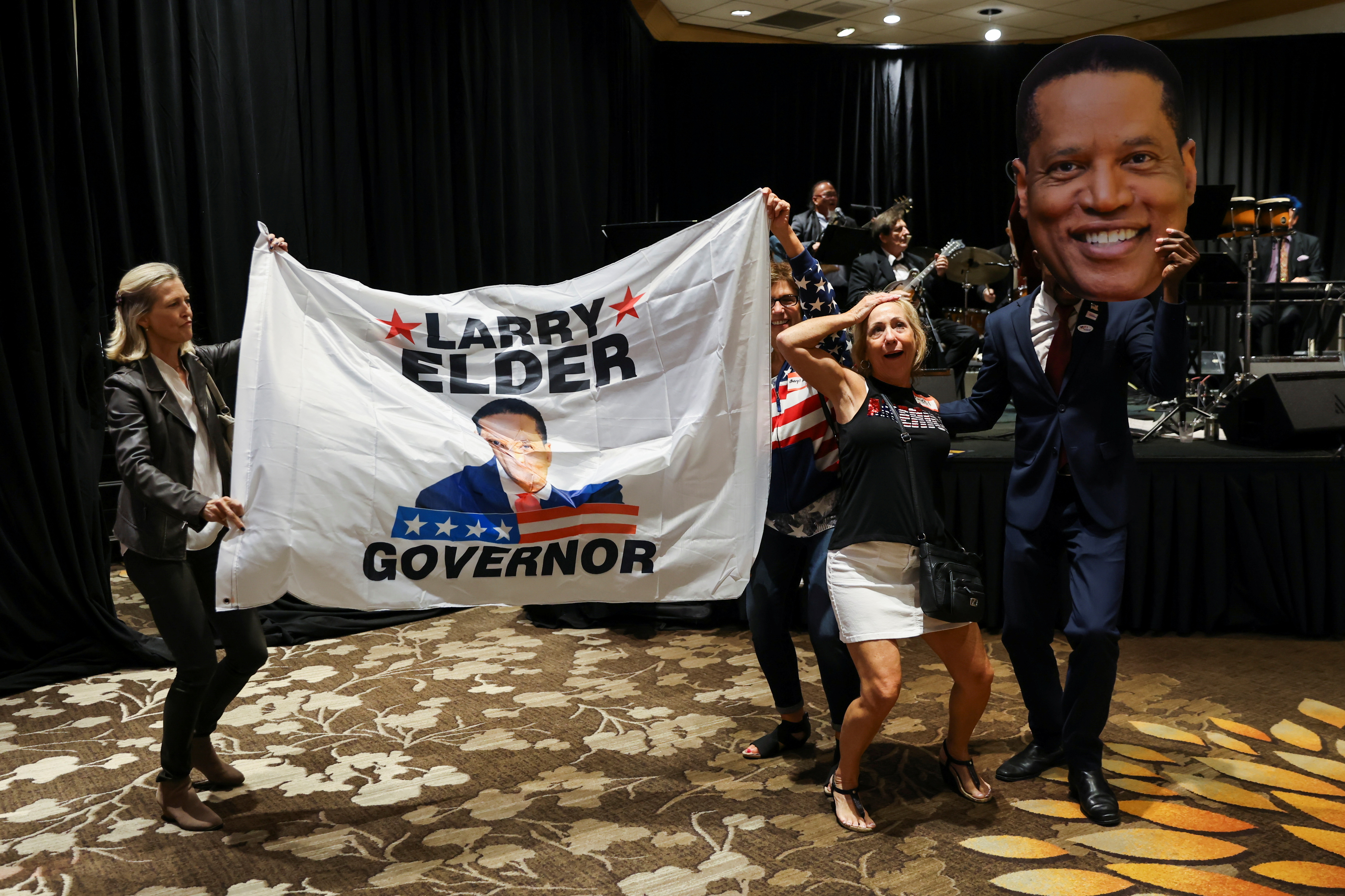 US: California Governor Newsom easily retains job, sweeps election 6 Supporters of Republican gubernatorial candidate Larry Elder gather on election night in Costa Mesa, California, U.S., September 14, 2021. REUTERS/Mike Blake