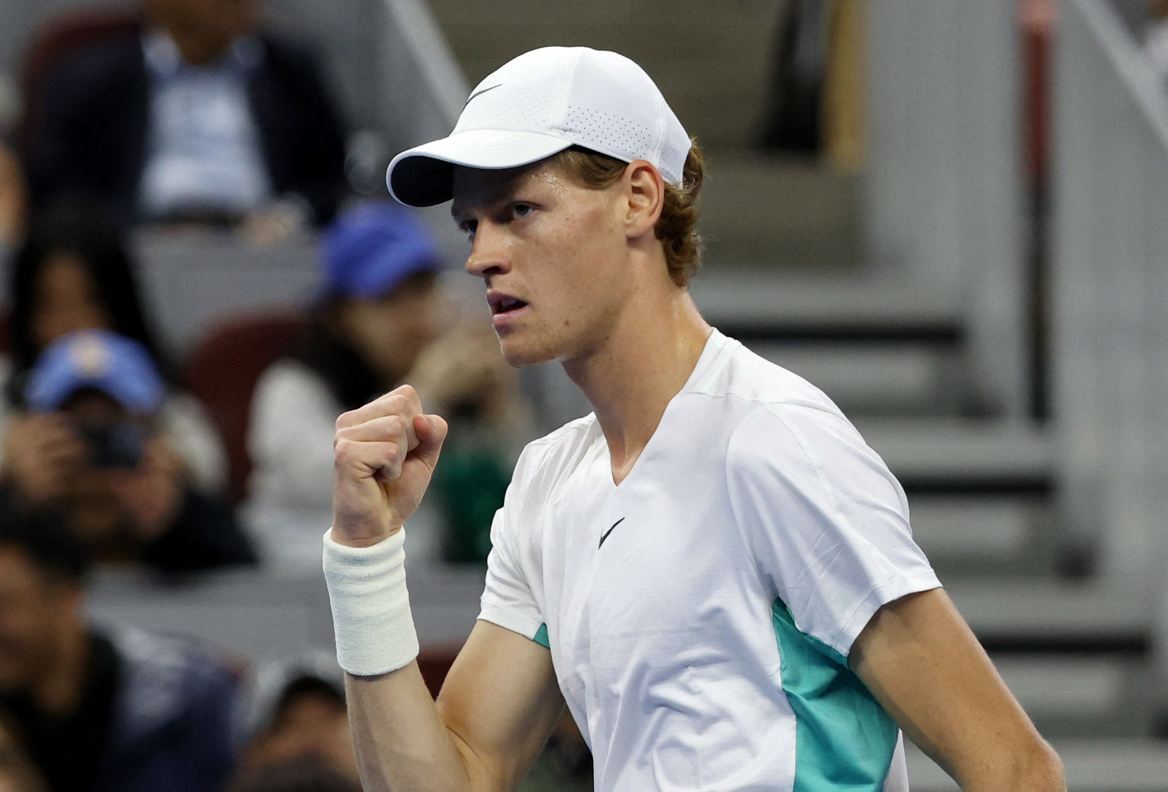 Daniil Medvedev of Russia, right, poses after winning the final