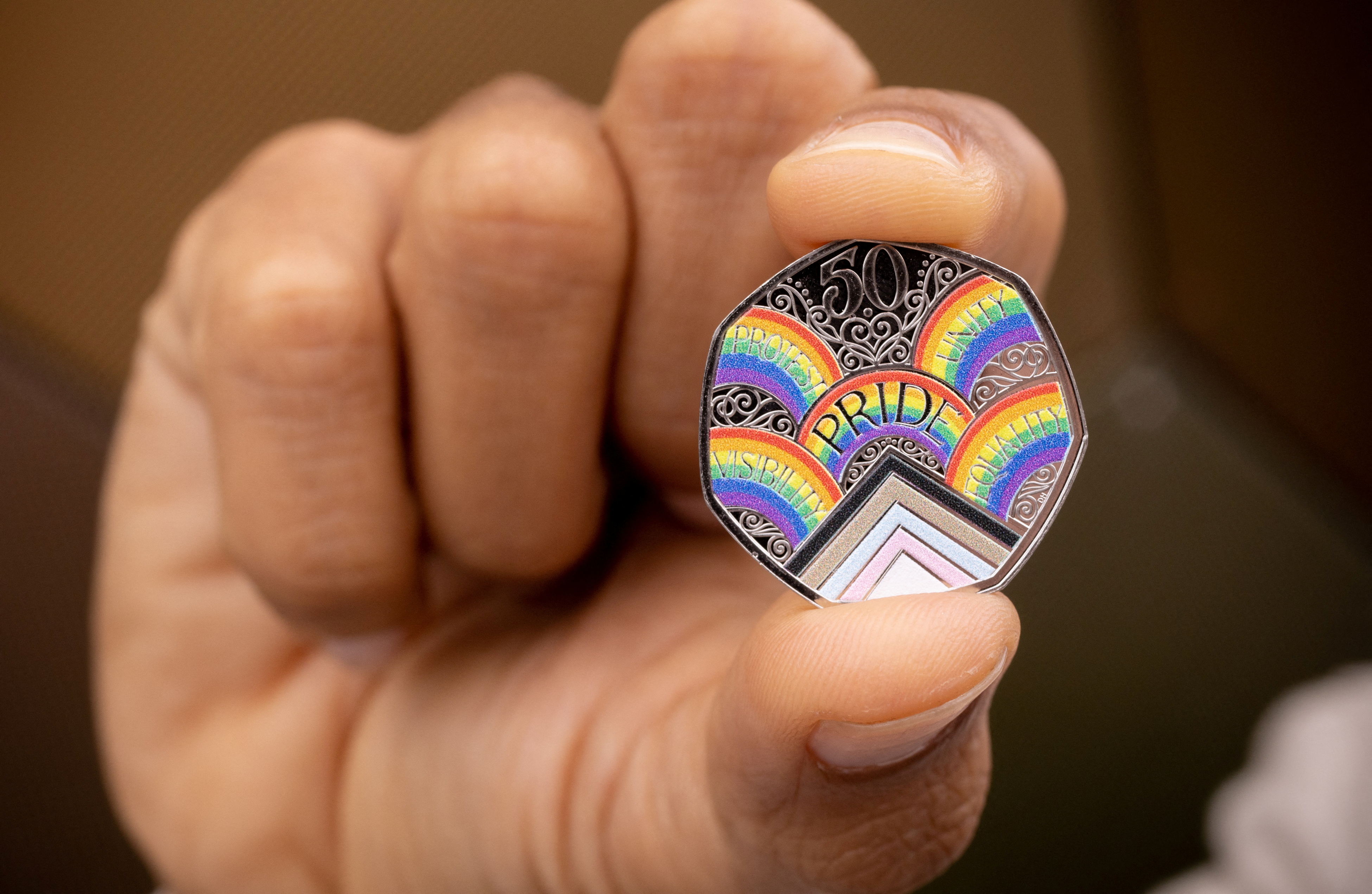 Britain's Royal Mint unveils commemorative 50p coin to celebrate 50th anniversary of Pride UK