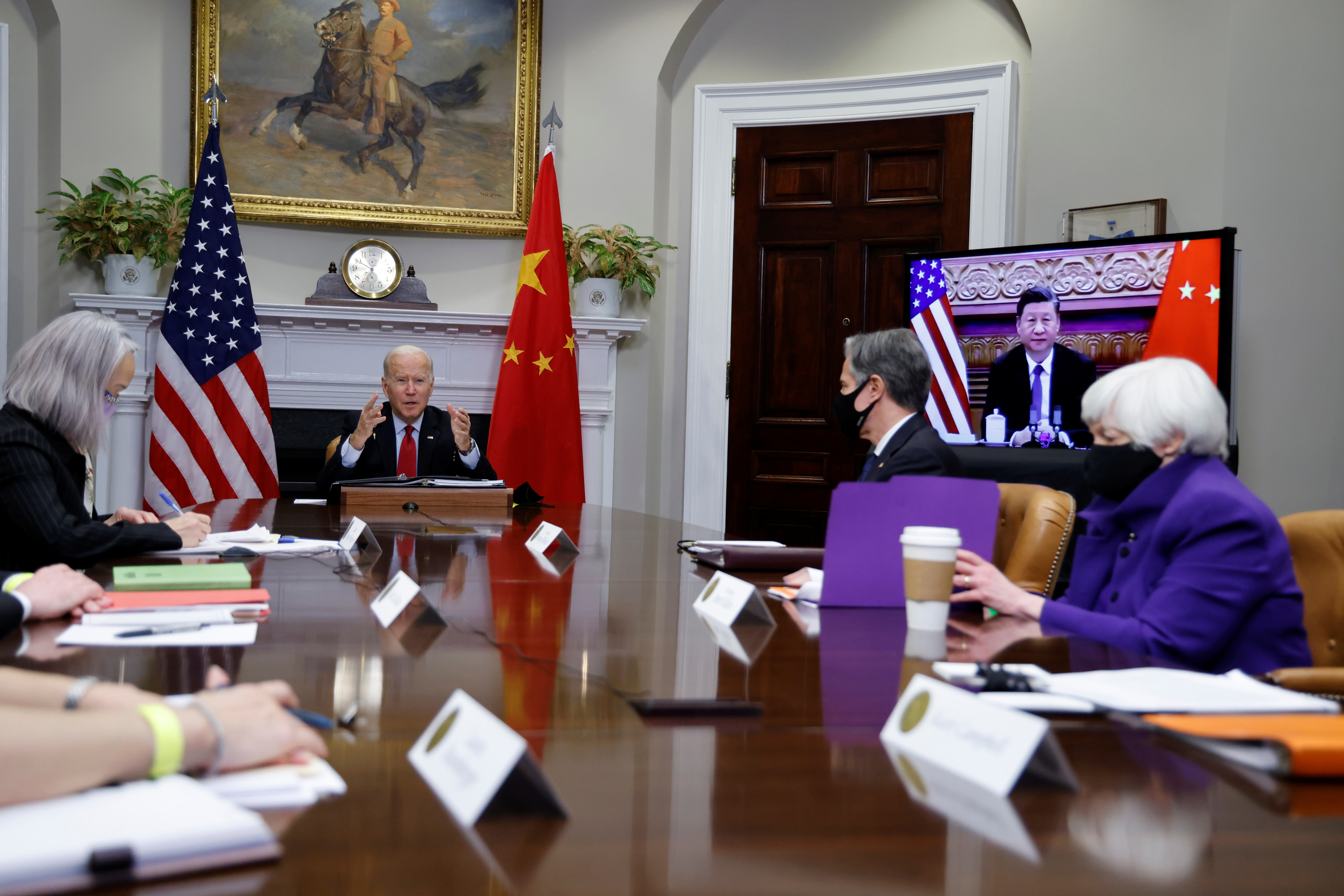U.S. President Joe Biden, with Secretary of State Antony Blinken and Treasury Secretary Janet Yellen, speaks virtually with Chinese leader Xi Jinping from the White House in Washington, U.S. November 15, 2021.  REUTERS/Jonathan Ernst