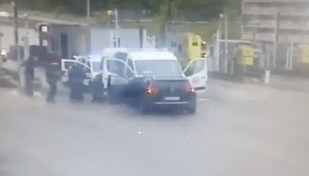 Gunmen wearing balaclavas ambush a prison van to free a drug dealer in Val-de-Reuil