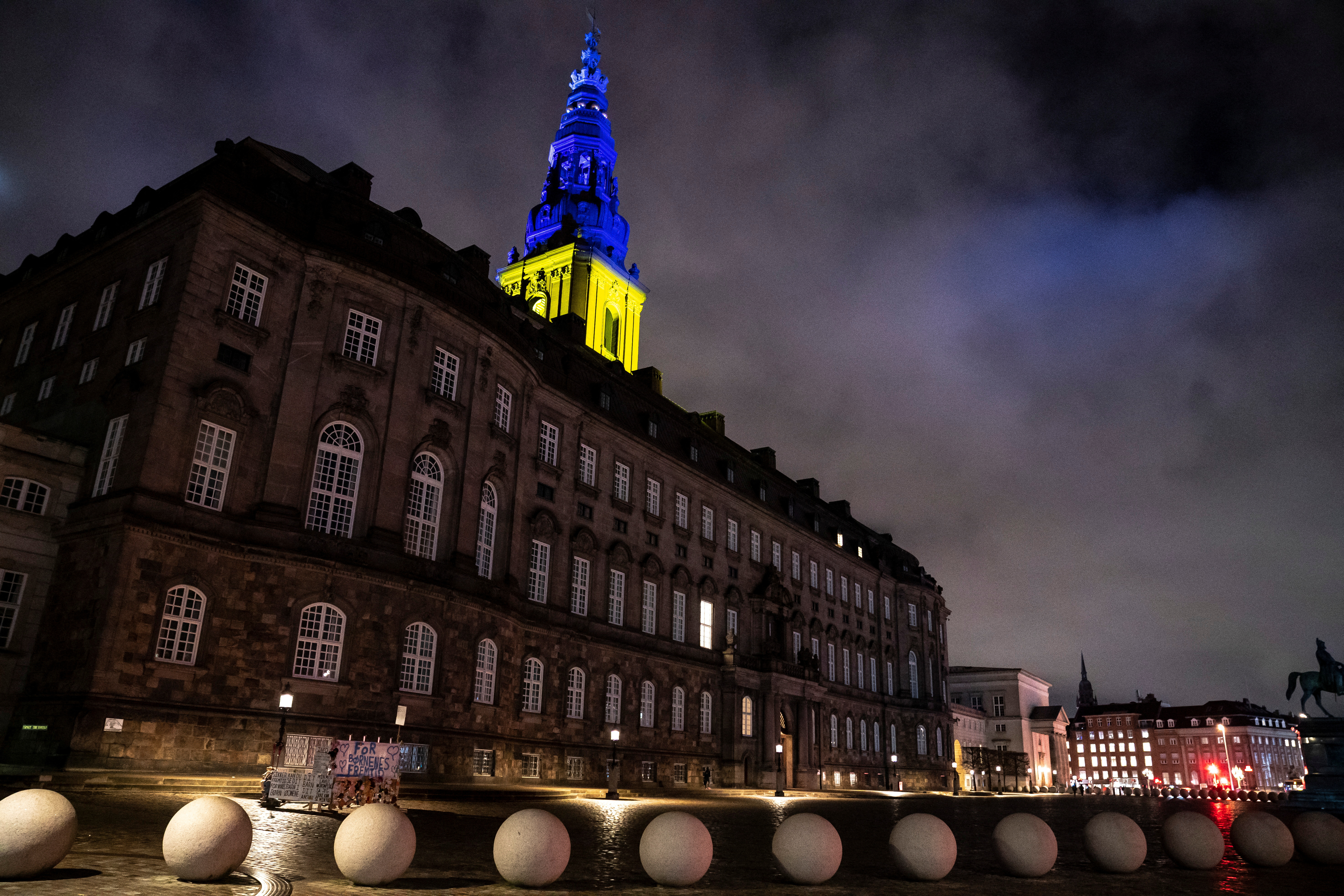 Christiansborg Palace is lit in the colours of the Ukrainian flag, in Copenhagen