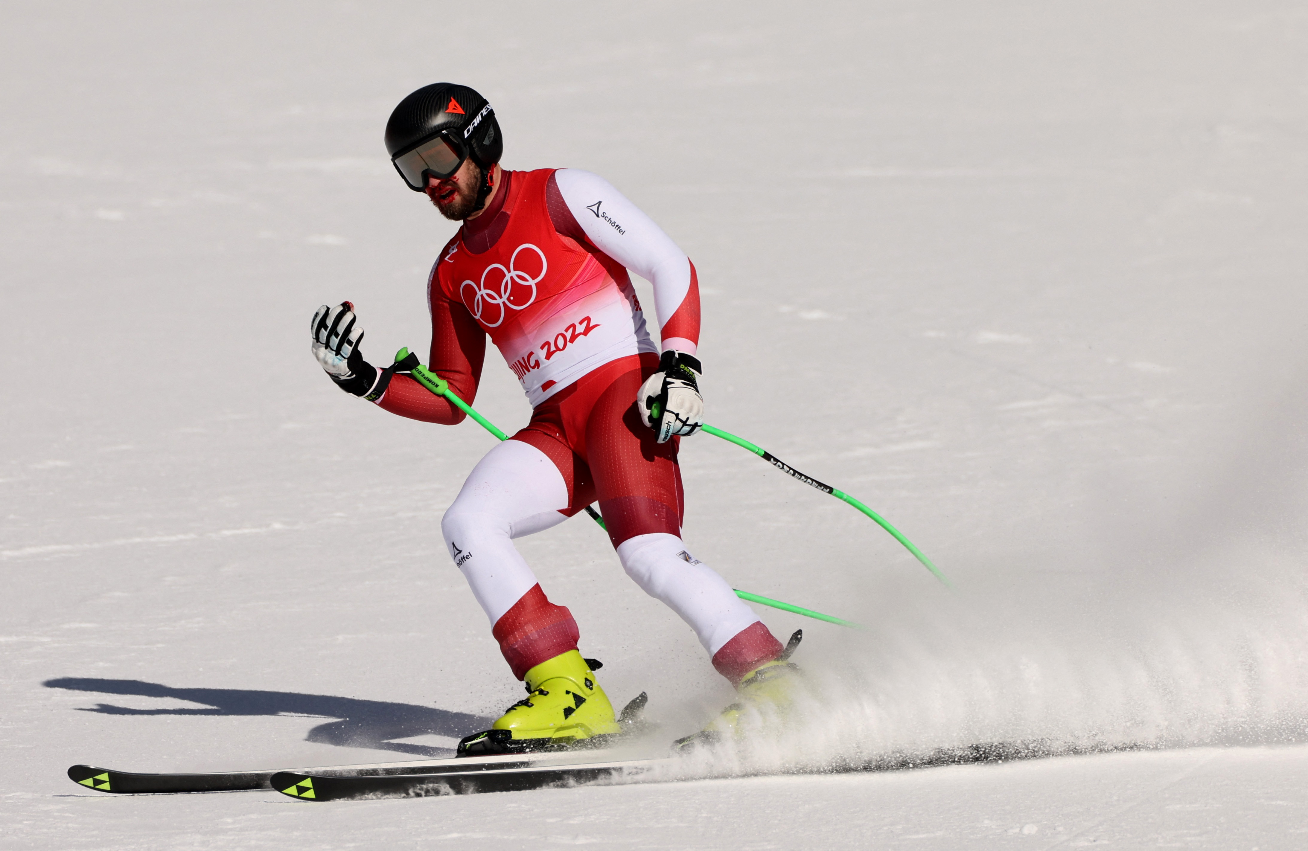 Alpine SkiingAustria's Hemetsberger finishes downhill race despite