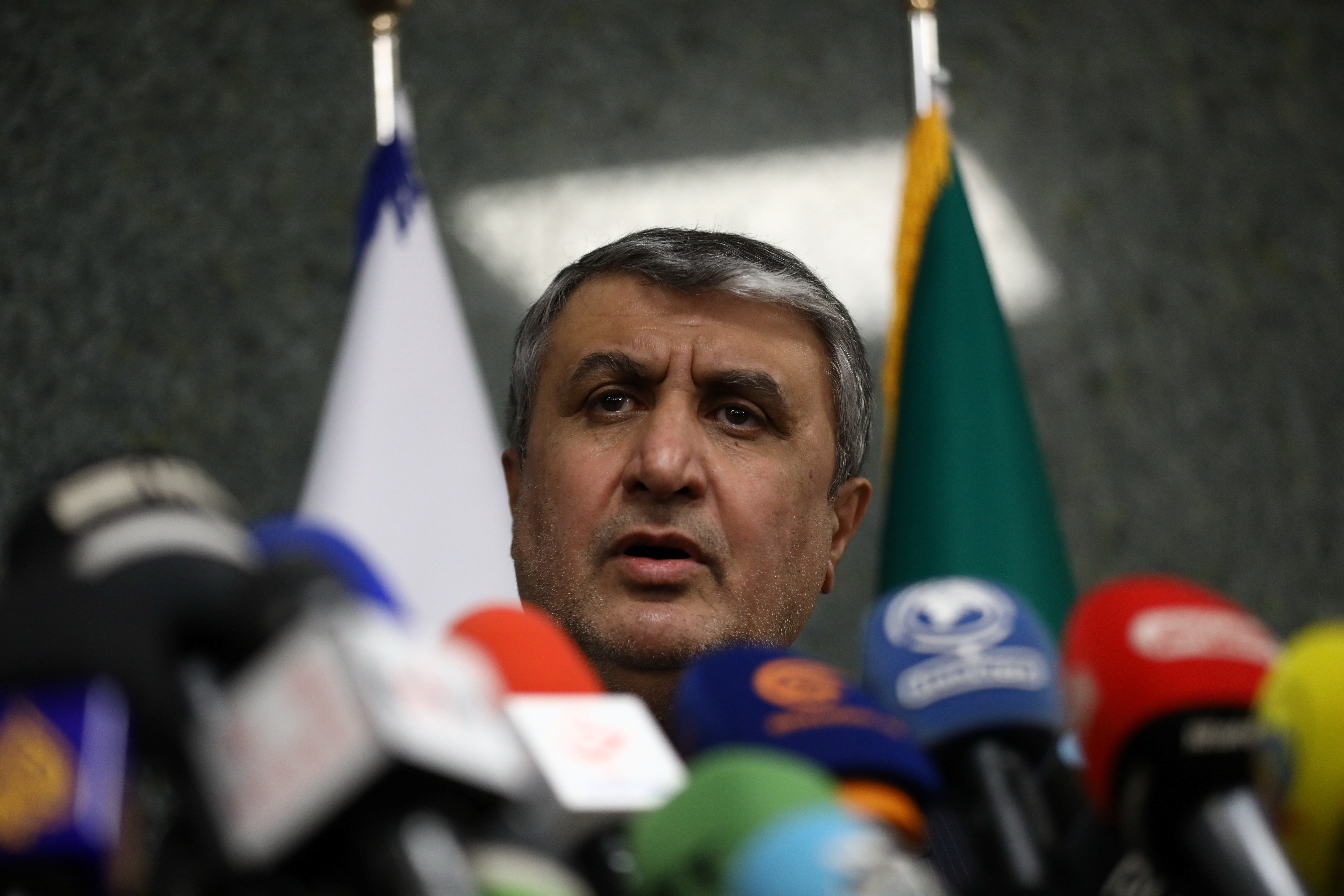 Head of Iran's Atomic Energy Organization Mohammad Eslami looks on during a news conference with International Atomic Energy Agency (IAEA) Director General Rafael Mariano Grossi as they meet in Tehran