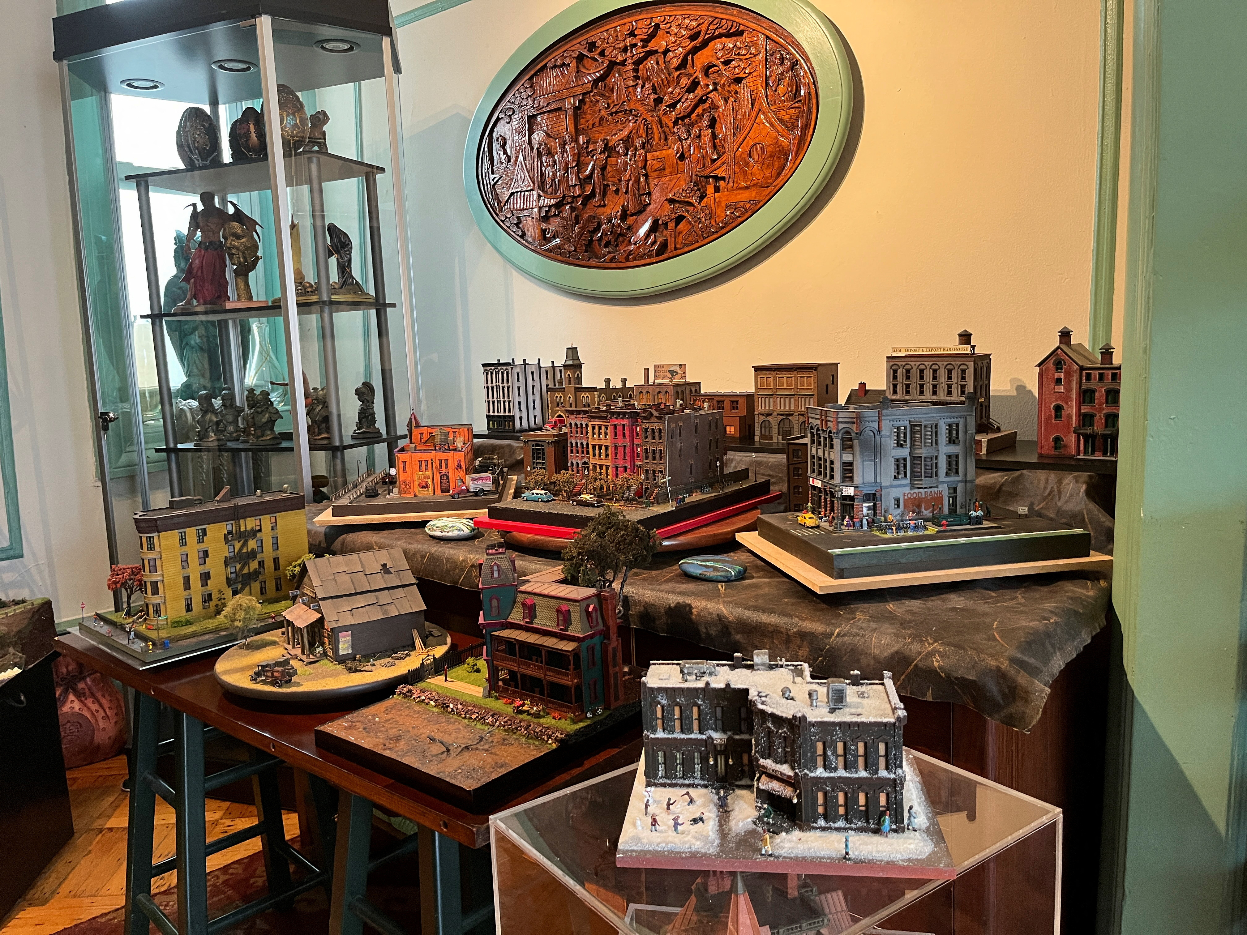 Aaron Kinard's dioramas of mostly urban life, created during the pandemic, are displayed at his home in Brooklyn