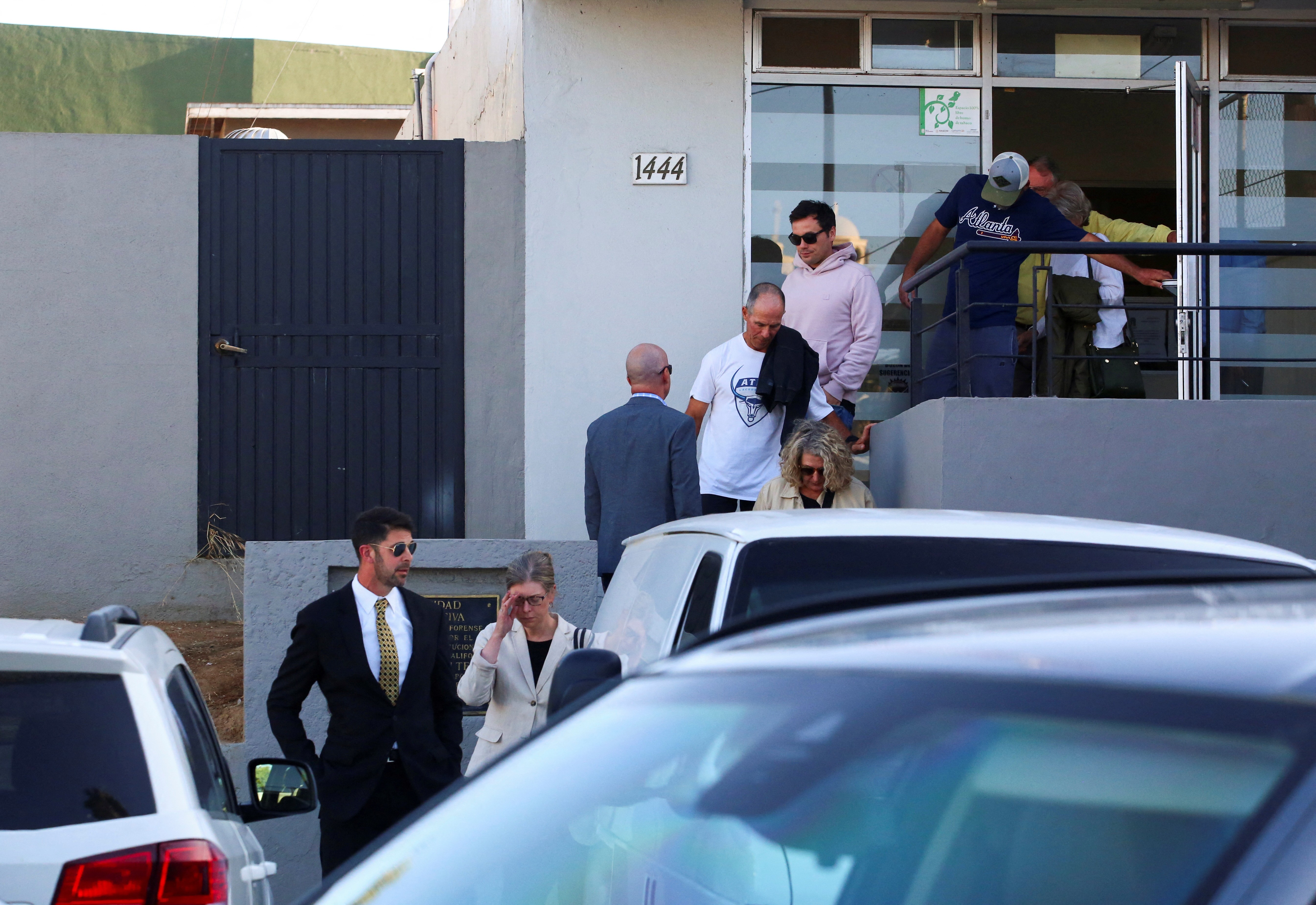 Members of the United States and Australian embassies and the parents of missing U.S. and Australian tourists leave the Forensic Medical Service in Ensenada