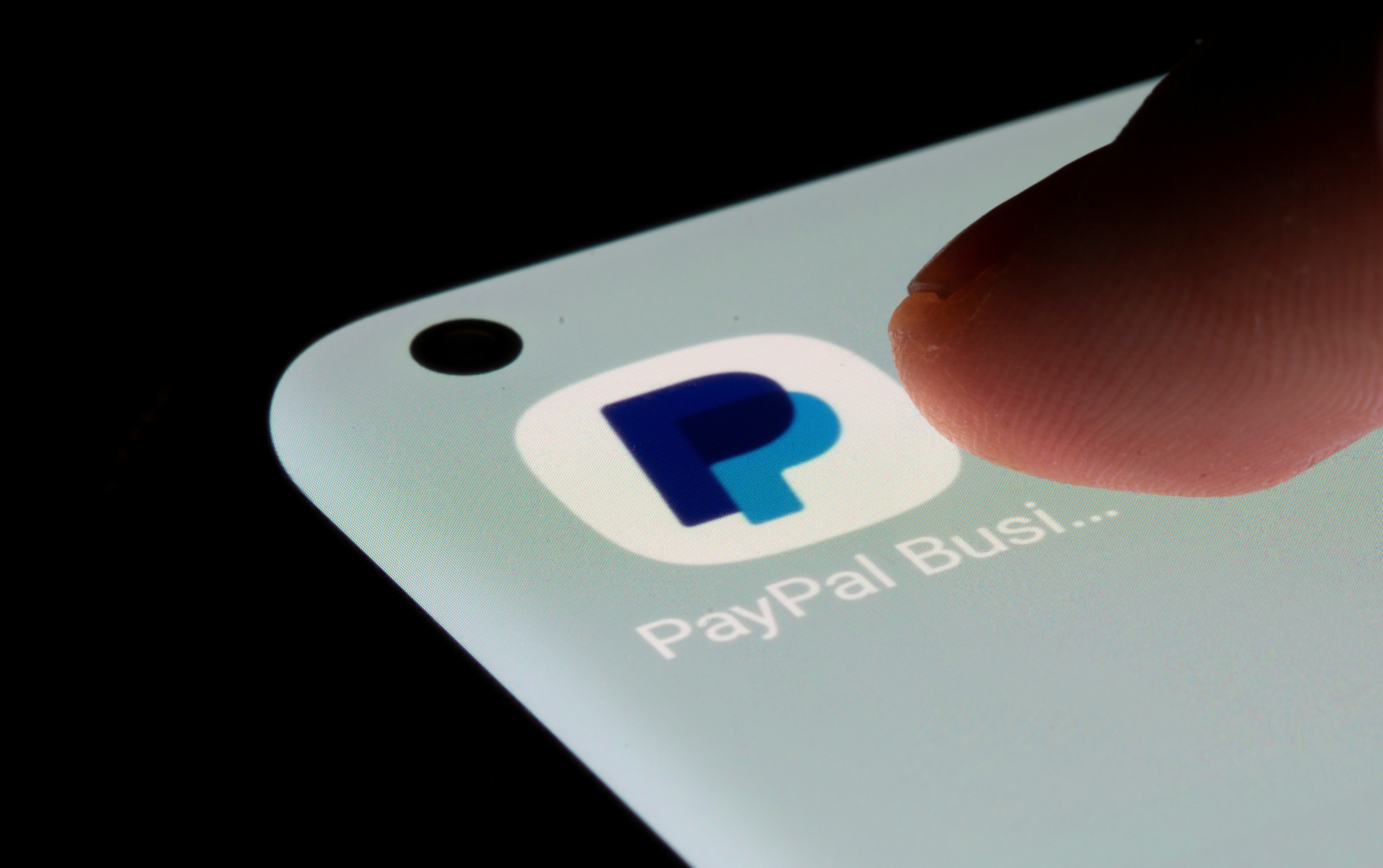 PayPal app is seen on a smartphone in this illustration taken