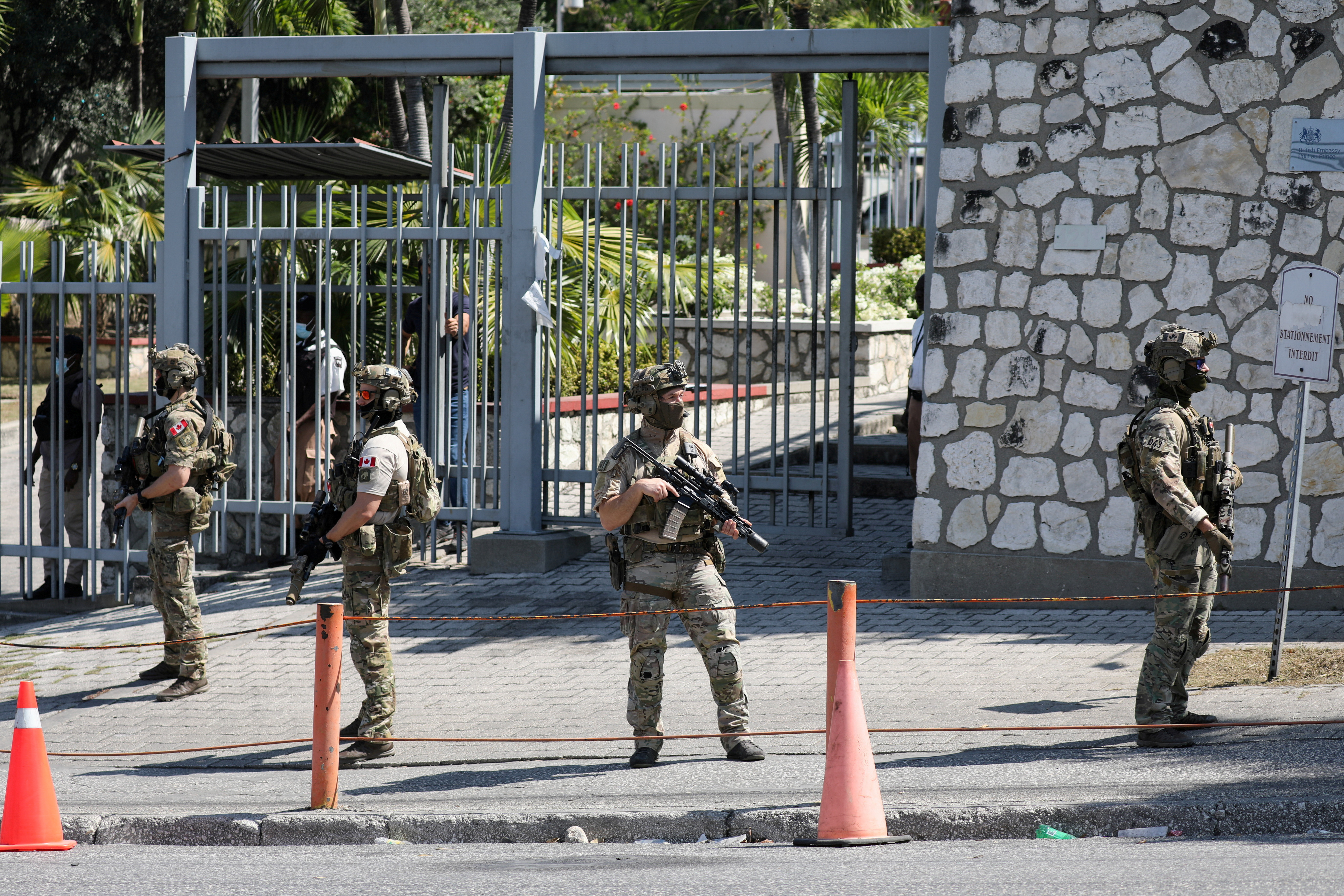 Canadian soldiers guard the Canadian embassy in Port-au-Prince