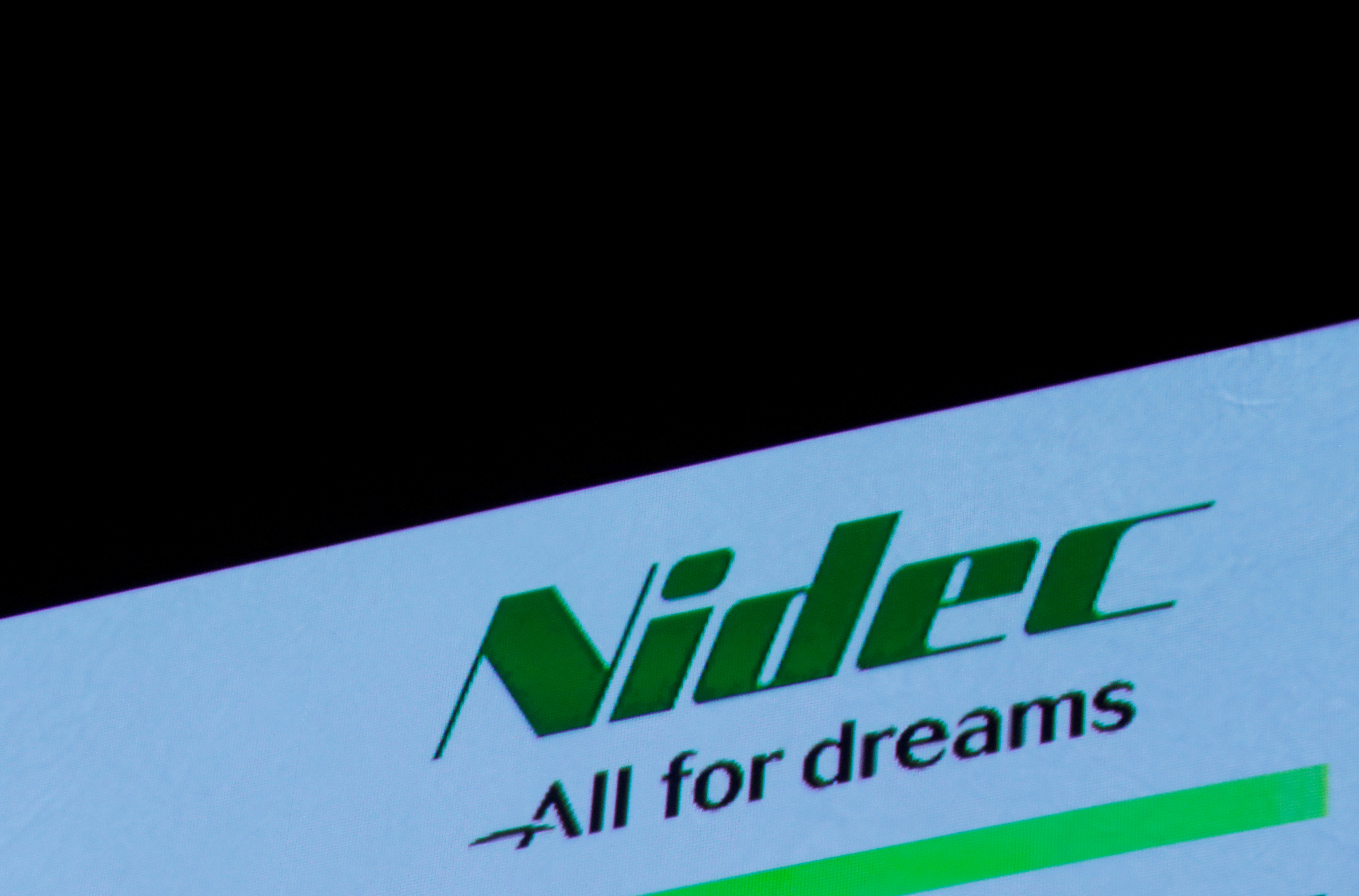 Nidec Corp's logo is pictured at an earnings results news conference in Tokyo