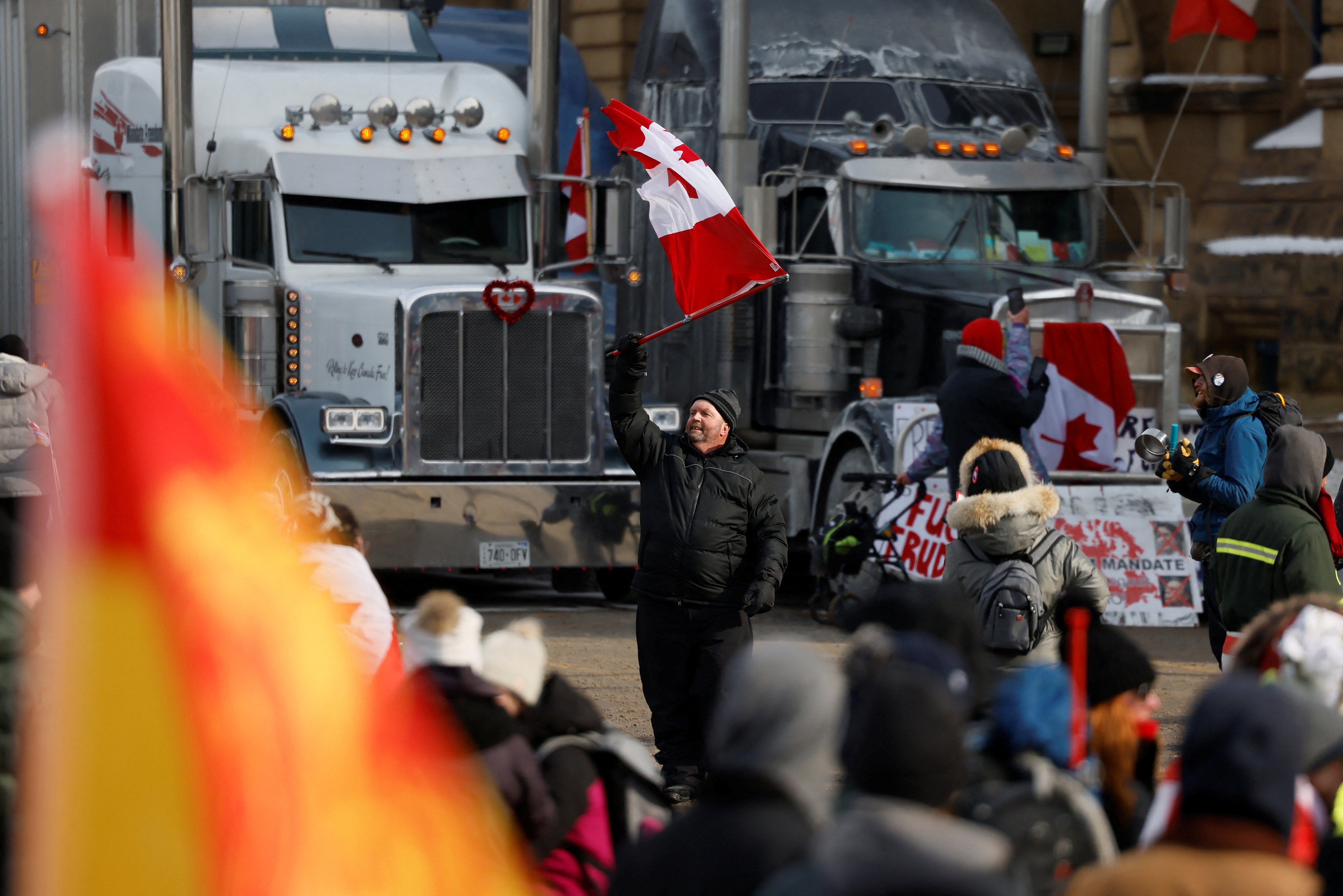 Truckers and supporters continue to protest coronavirus disease (COVID-19) vaccine mandates in front of Parliament Hill in Ottawa